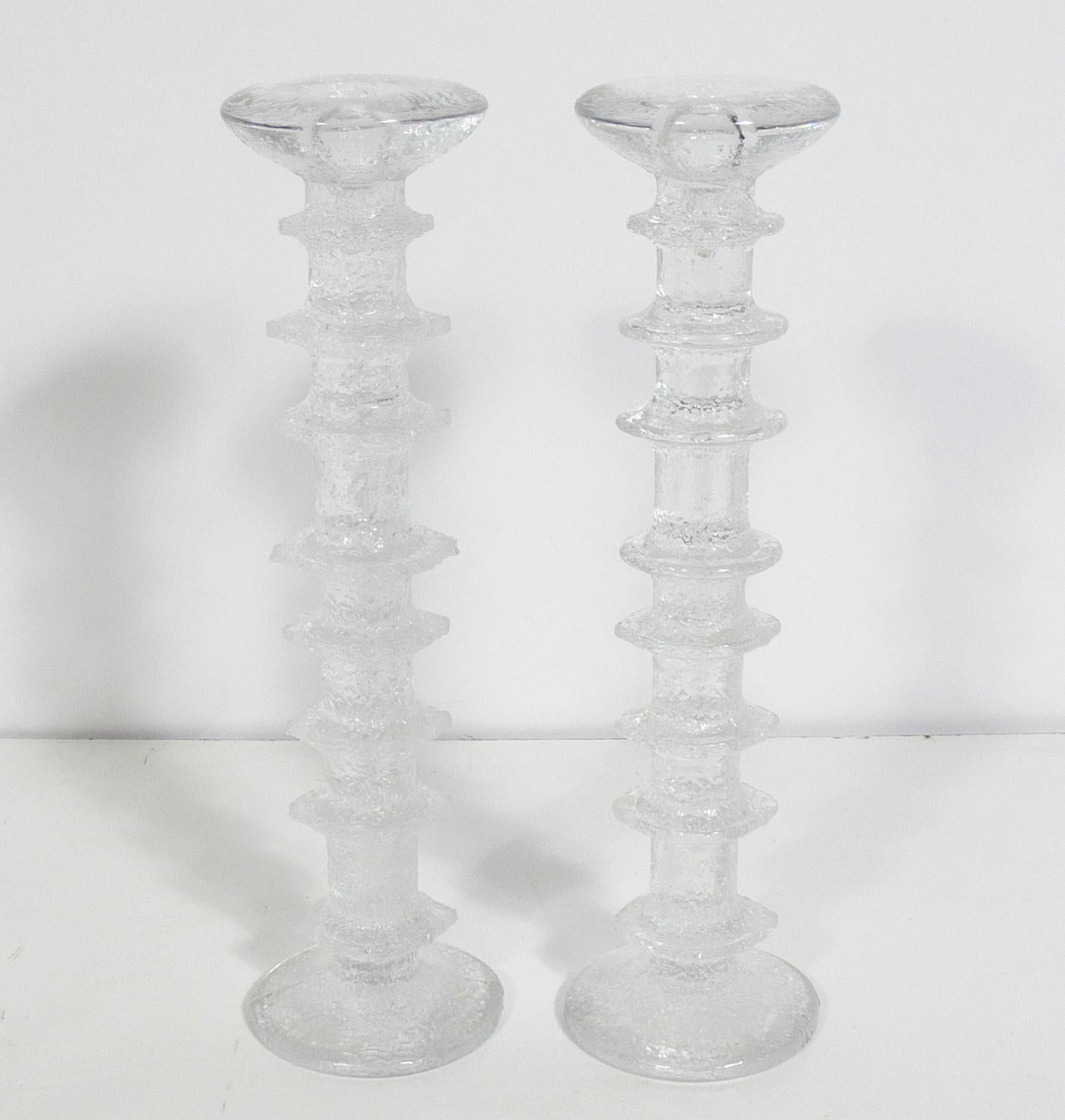 Collection of sculptural Festivo candlesticks by Timo Sarpaneva for Iittala, Finland, circa 1960s. This collection consists of eighteen candlesticks. The largest measures 9.5