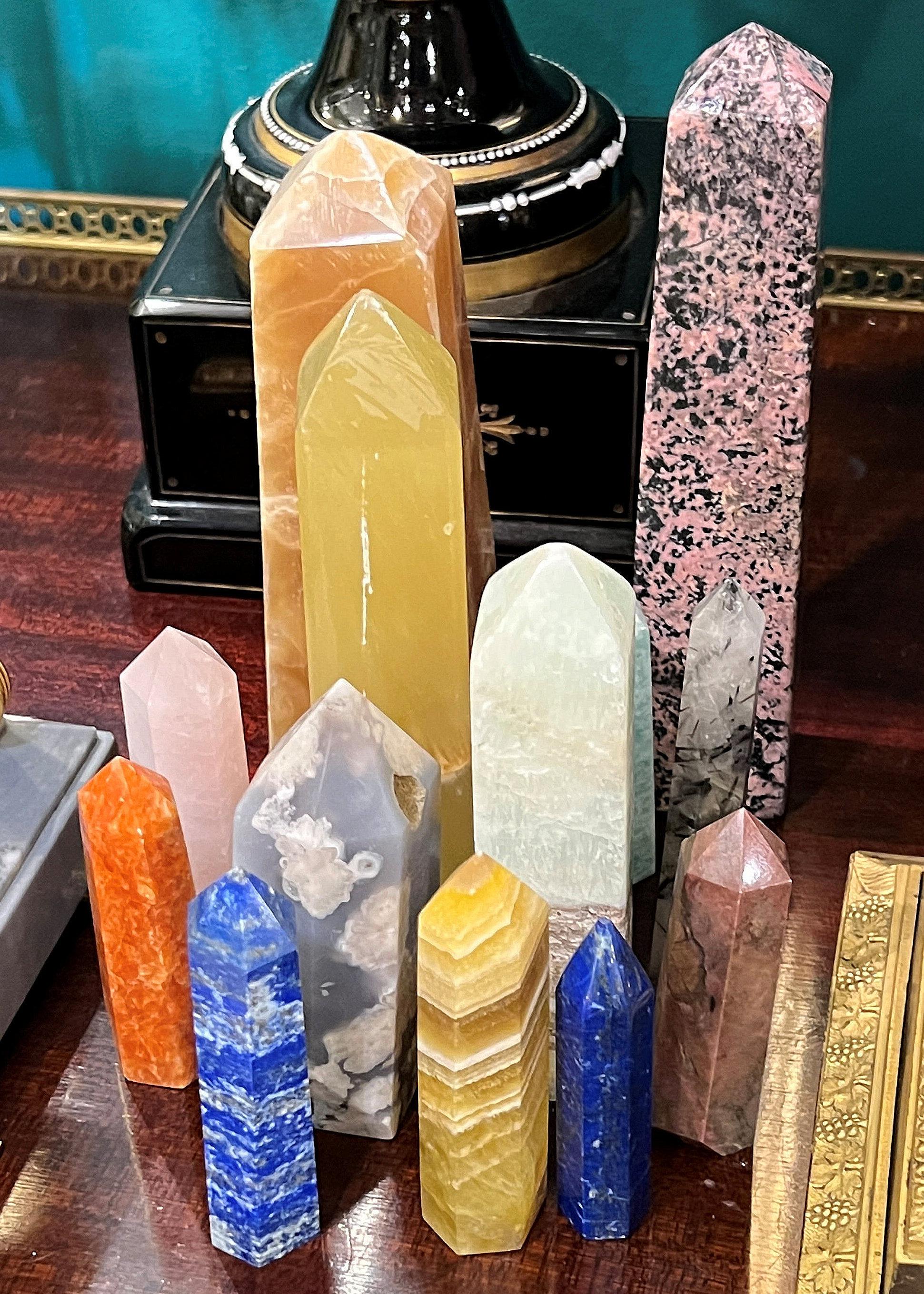 Collection of various exotic stones including Lapis, onyx, quartz etc Obelisks, 224total ranging in height from 3 to 8 inches.