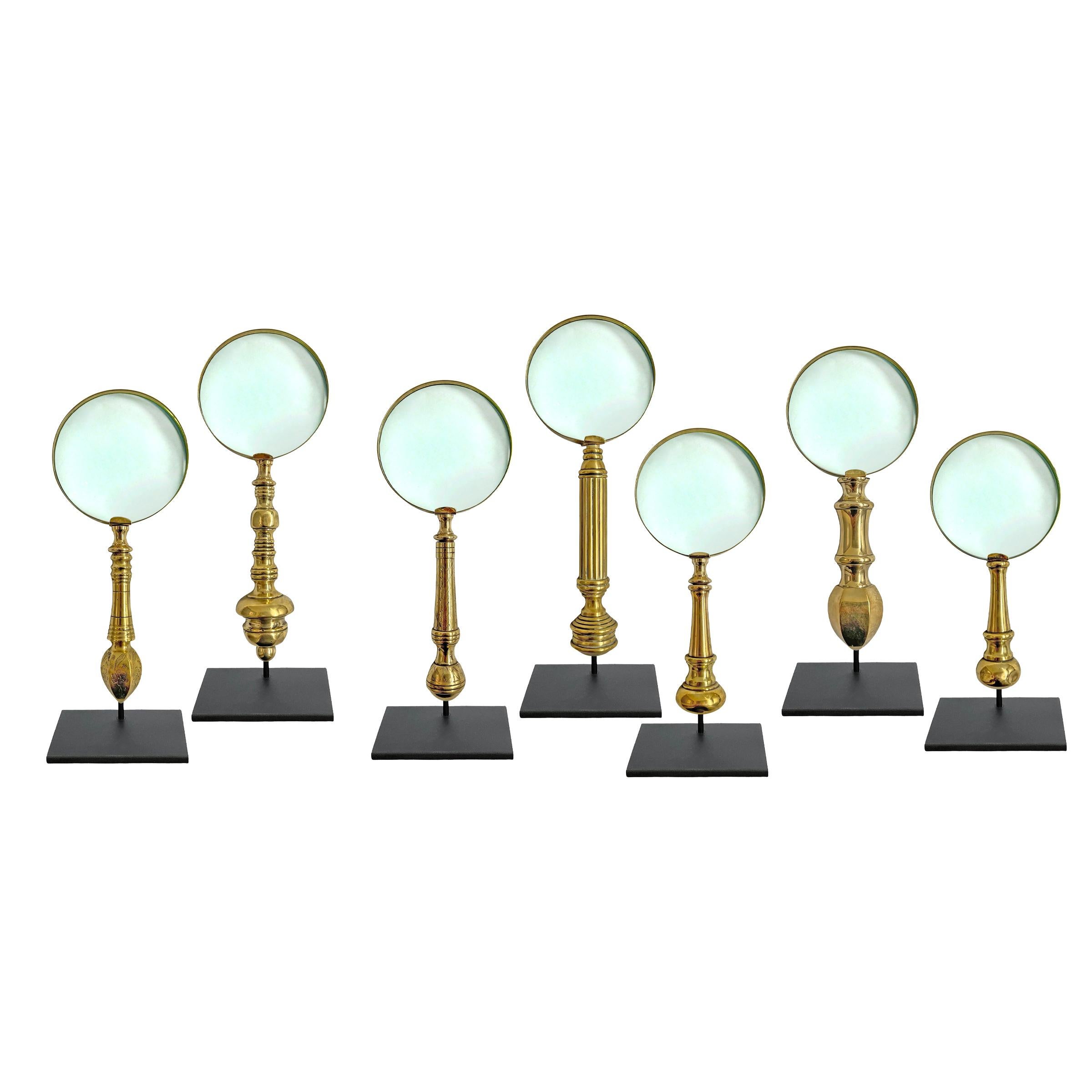 Collection of Seven 19th Century English Brass Magnifying Glasses on Mounts For Sale