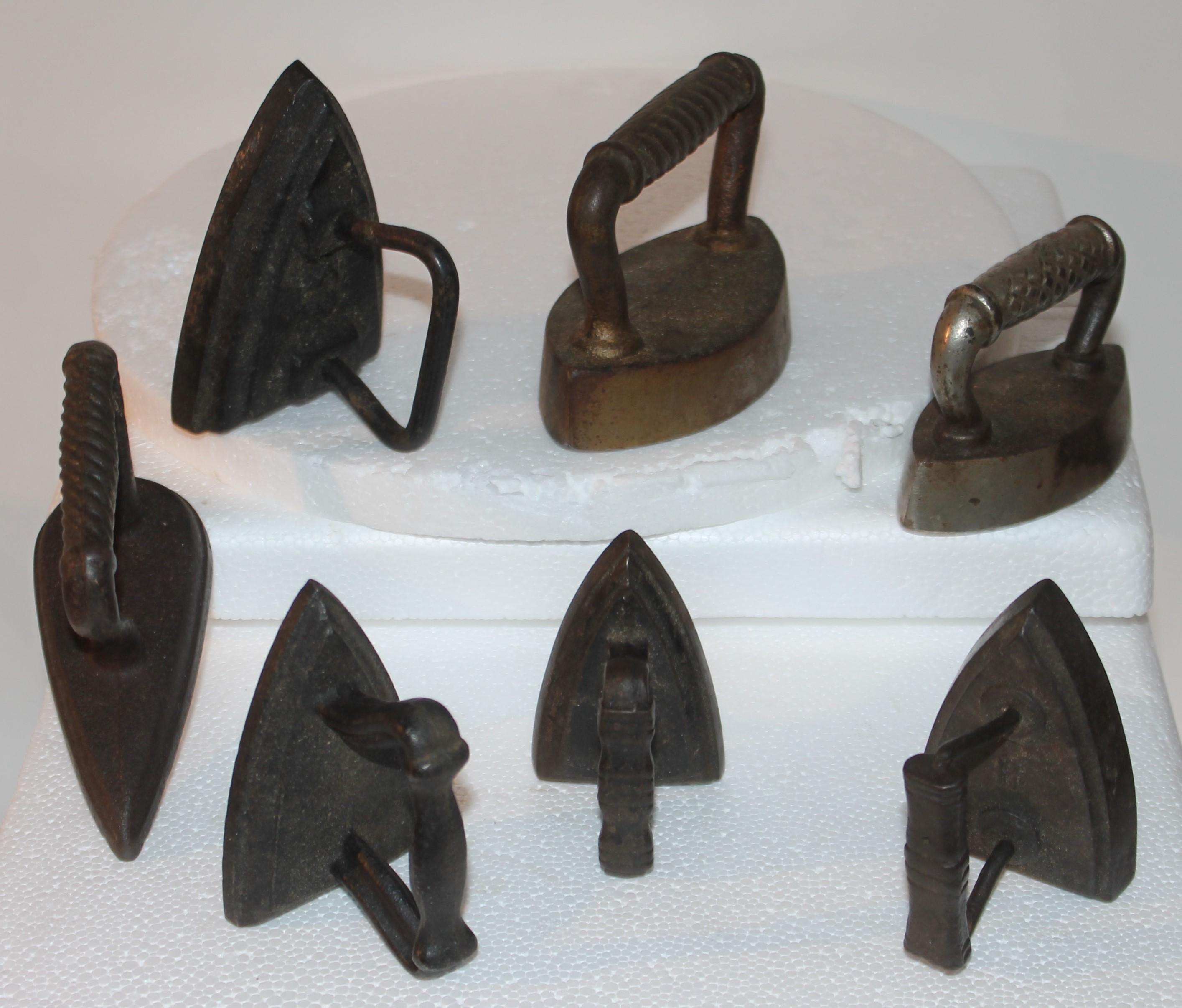 This fun collection of 19thc cast iron irons are most unusual and very hard to find. These irons were probably like salesman samples or children's.
largest miniature sat iron measures - 4.2 inches wide x 2 inches deep x 3.5 inches high
Smallest