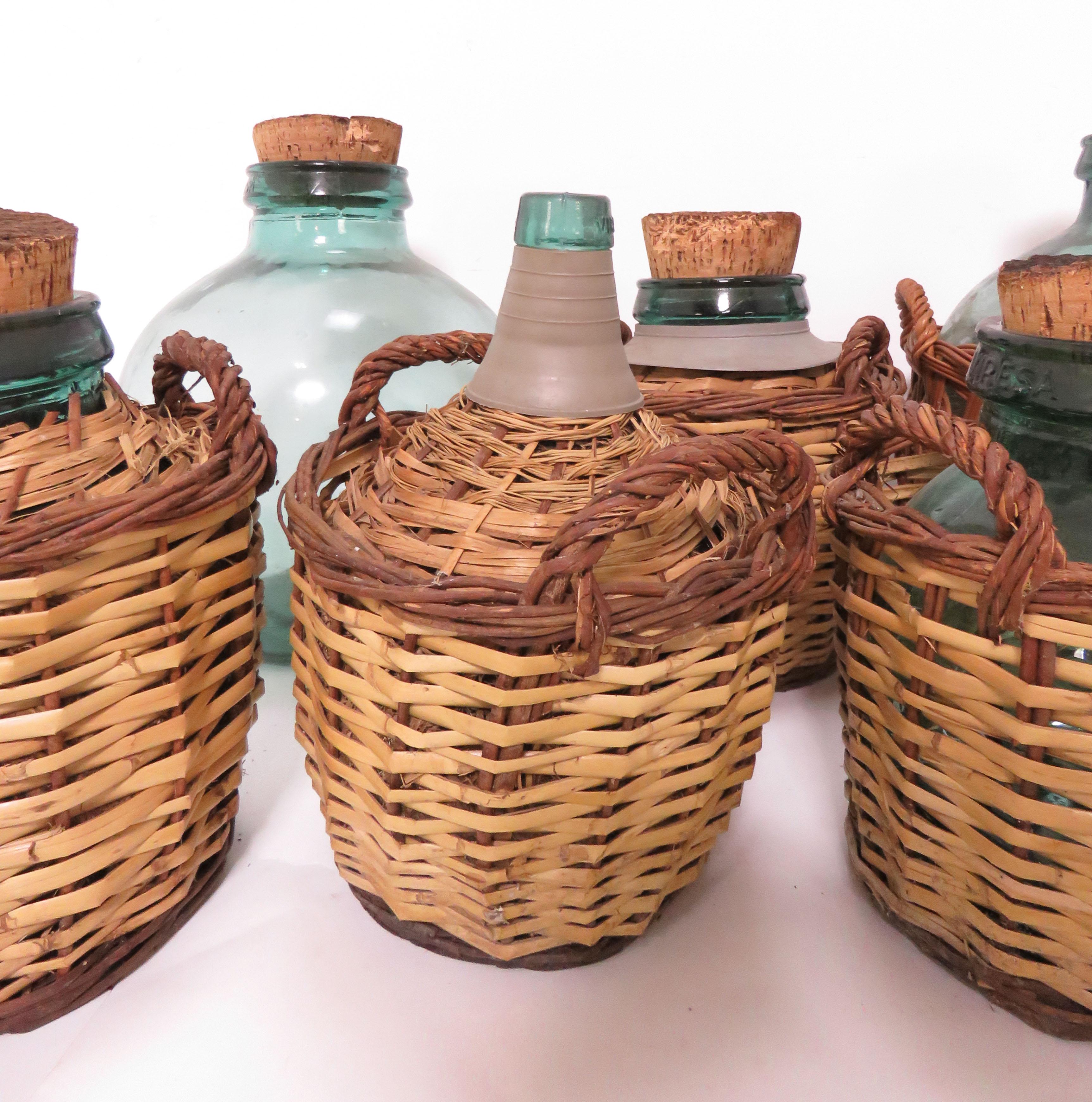 French Provincial Collection of Seven Antique French Demijohn Carboy Bottles, circa 1930s-1940s