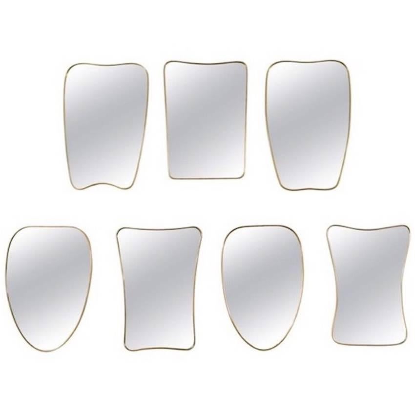 Collection of Seven Brass Framed Wall Mirrors in the Style of Gio Ponti