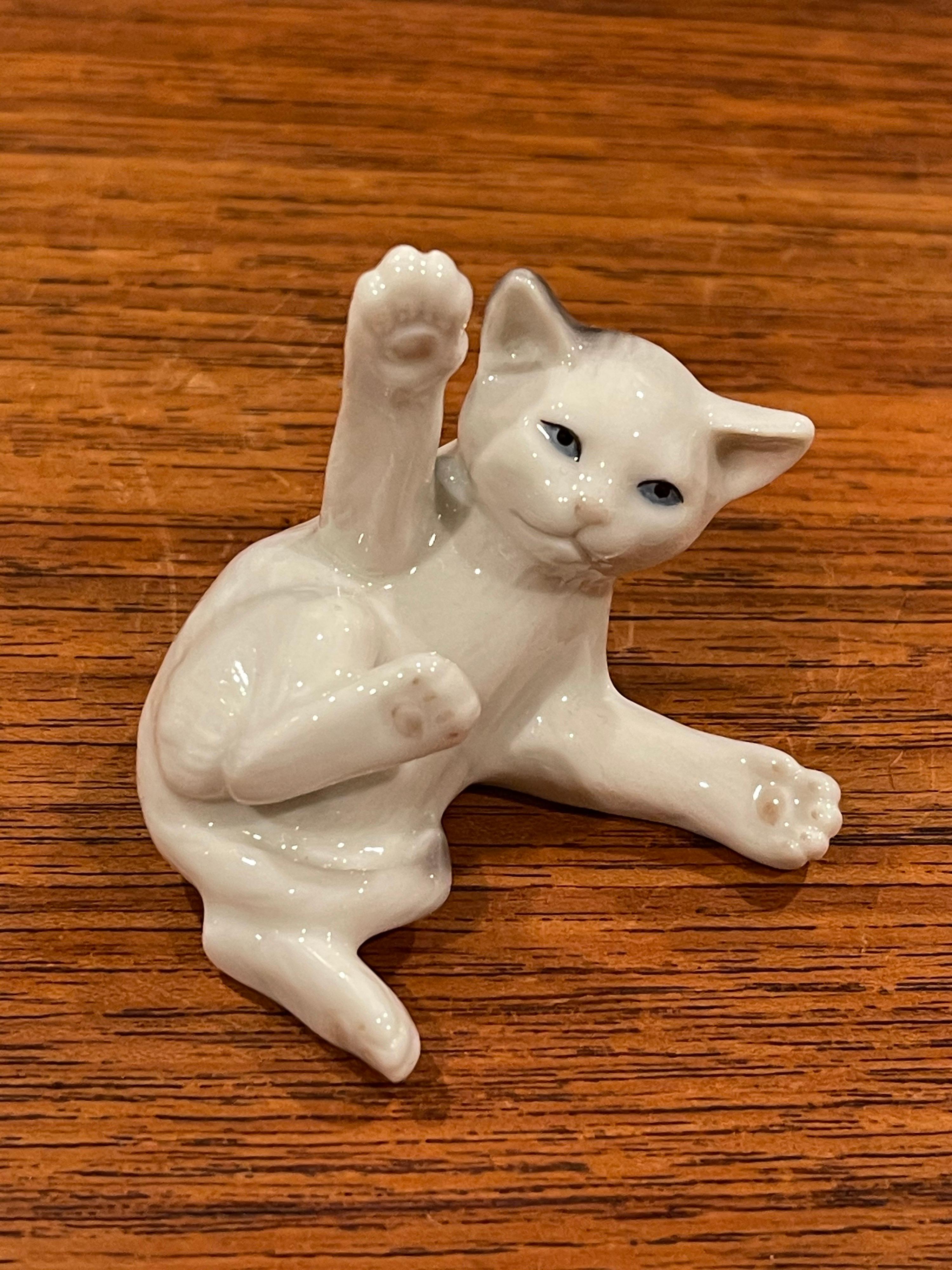Collection of Seven Miniature Porcelain Cat Sculptures by Royal Copenhagen In Good Condition In San Diego, CA