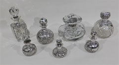 Collection of Seven Perfume Bottles circa 1890s Silver Overlay on Glass Baccarat
