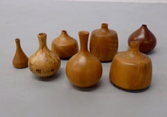 Collection of Seven Rude Osolnik Various Turned Wood Weed Pots