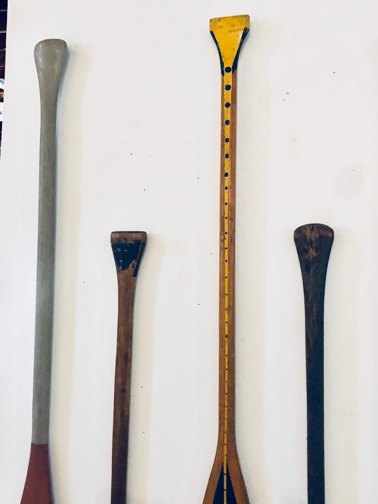 Collection of Six Antique Wooden Canoe Paddles with 