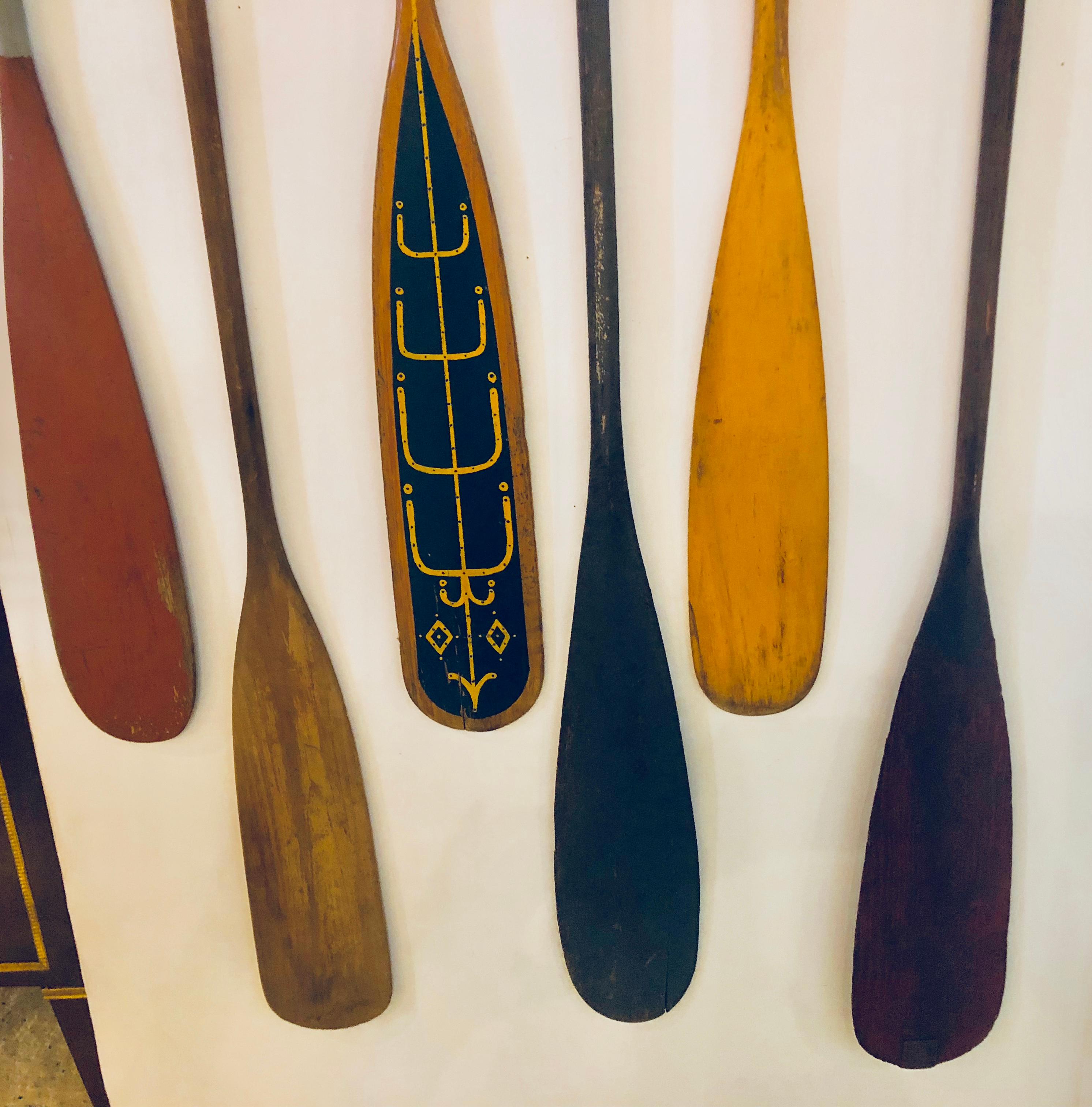 Collection of Six Antique Wooden Canoe Paddles with Original Painted Surfaces 1