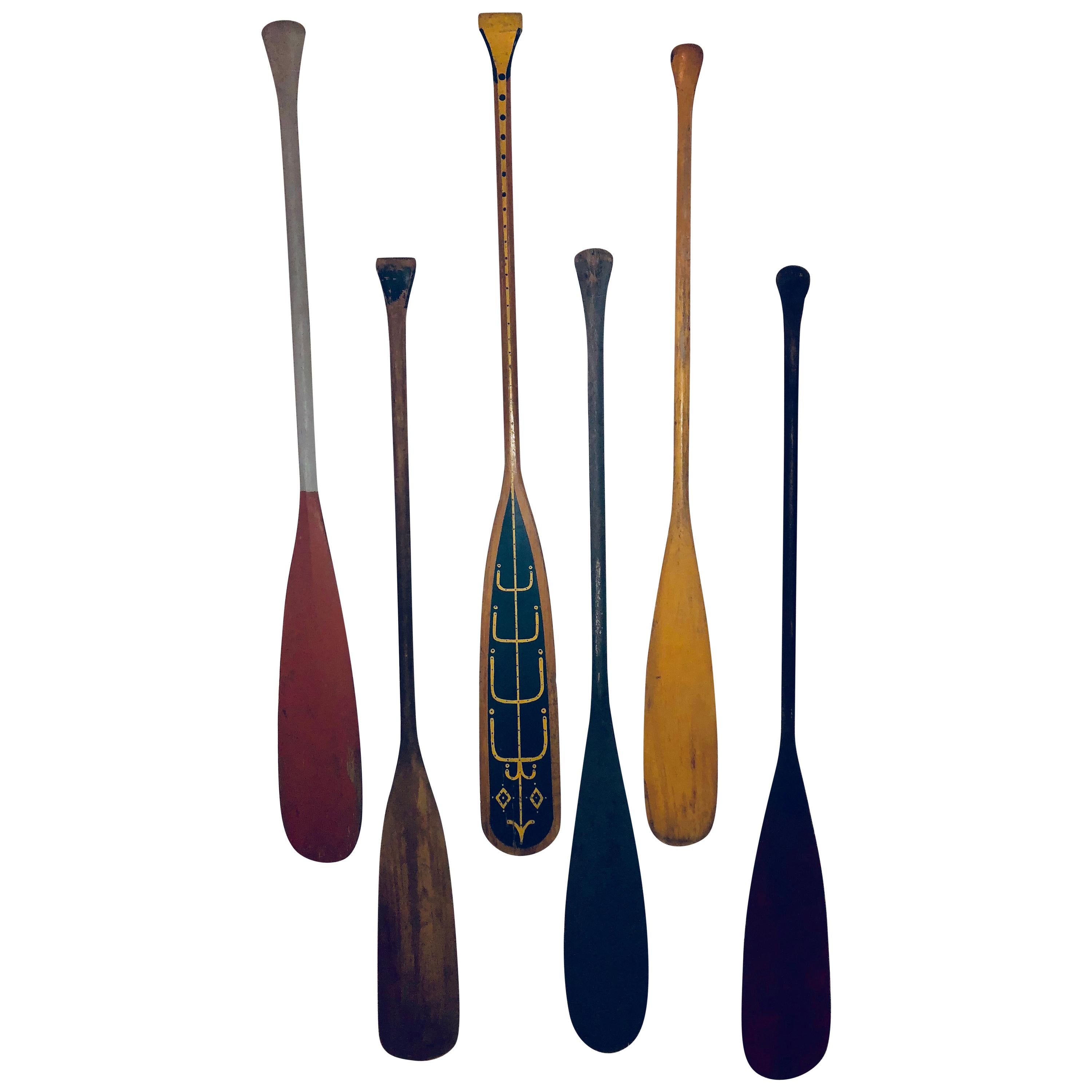 Collection of Six Antique Wooden Canoe Paddles with Original Painted Surfaces
