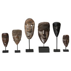 Collection of Six Dan and Bassa Passport Miniature Masks Ivory Coast Africa