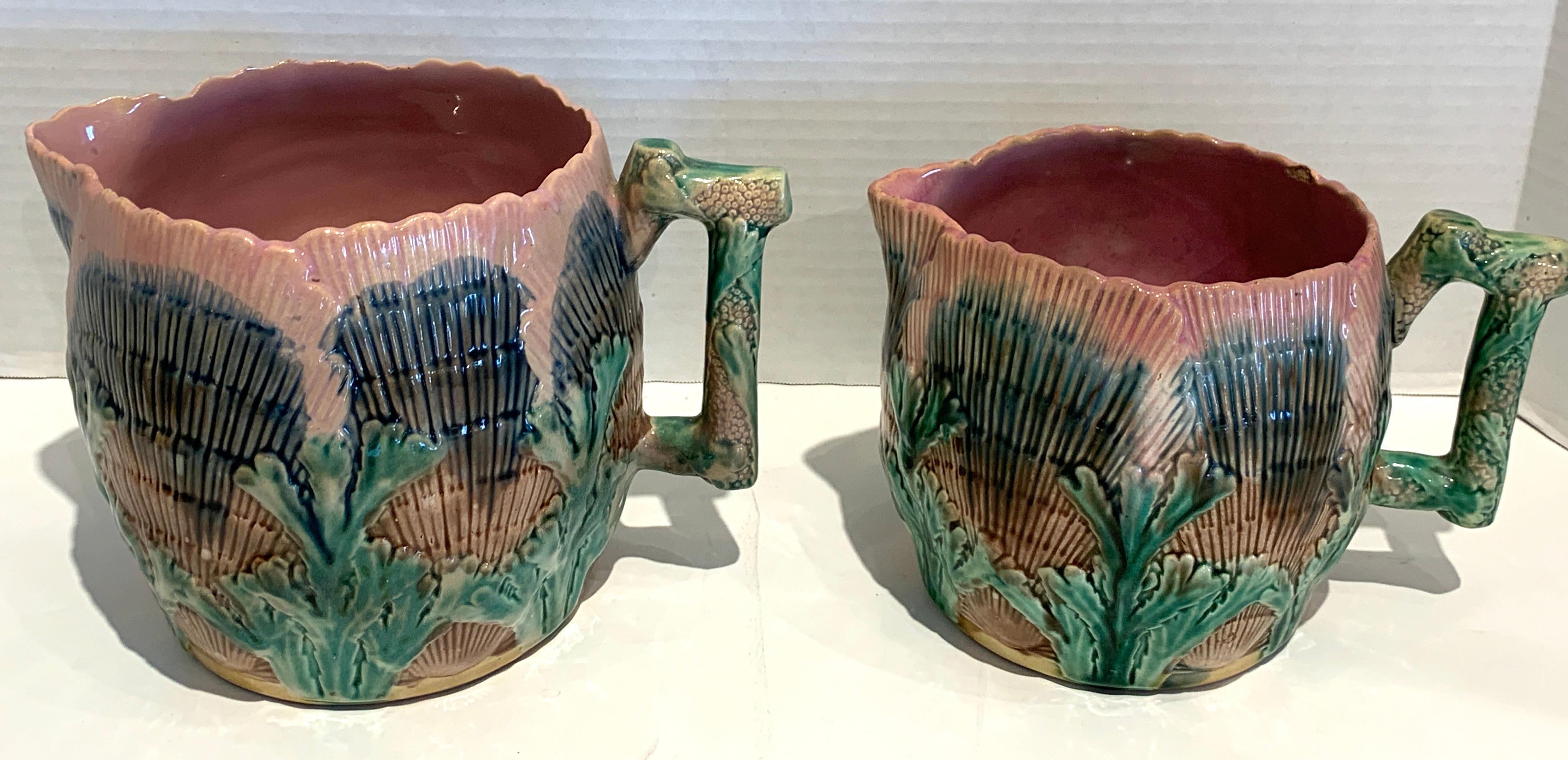 High Victorian Collection of Six Etruscan Majolica Shell and Seaweed Pitchers For Sale