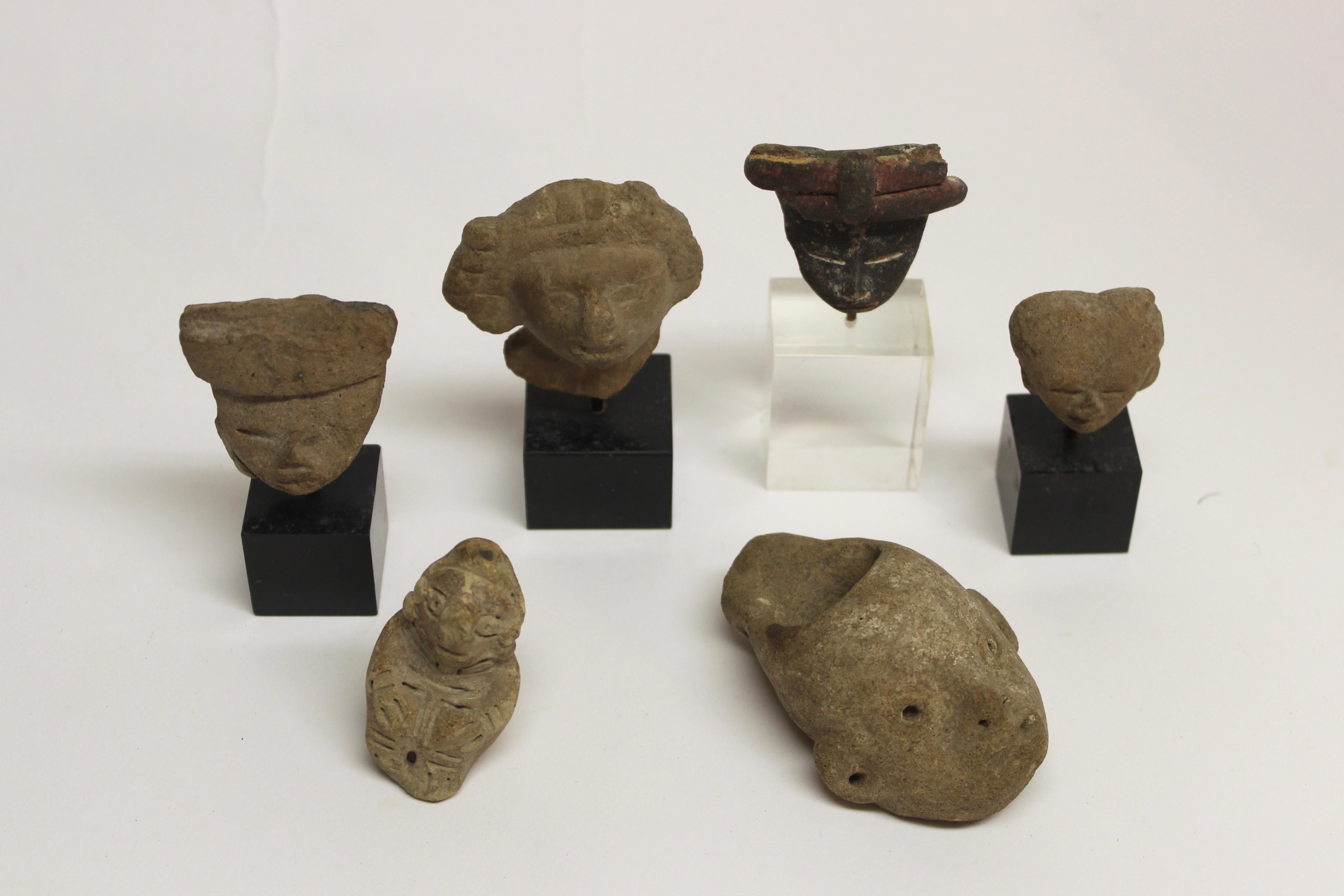 Collection of six Pre-Columbian pottery figures

They measure (as displayed from left):
#1. 2.25