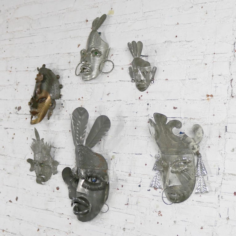 Collection of Six Tin Mexican Folk Art Masks of Varying Size Vintage