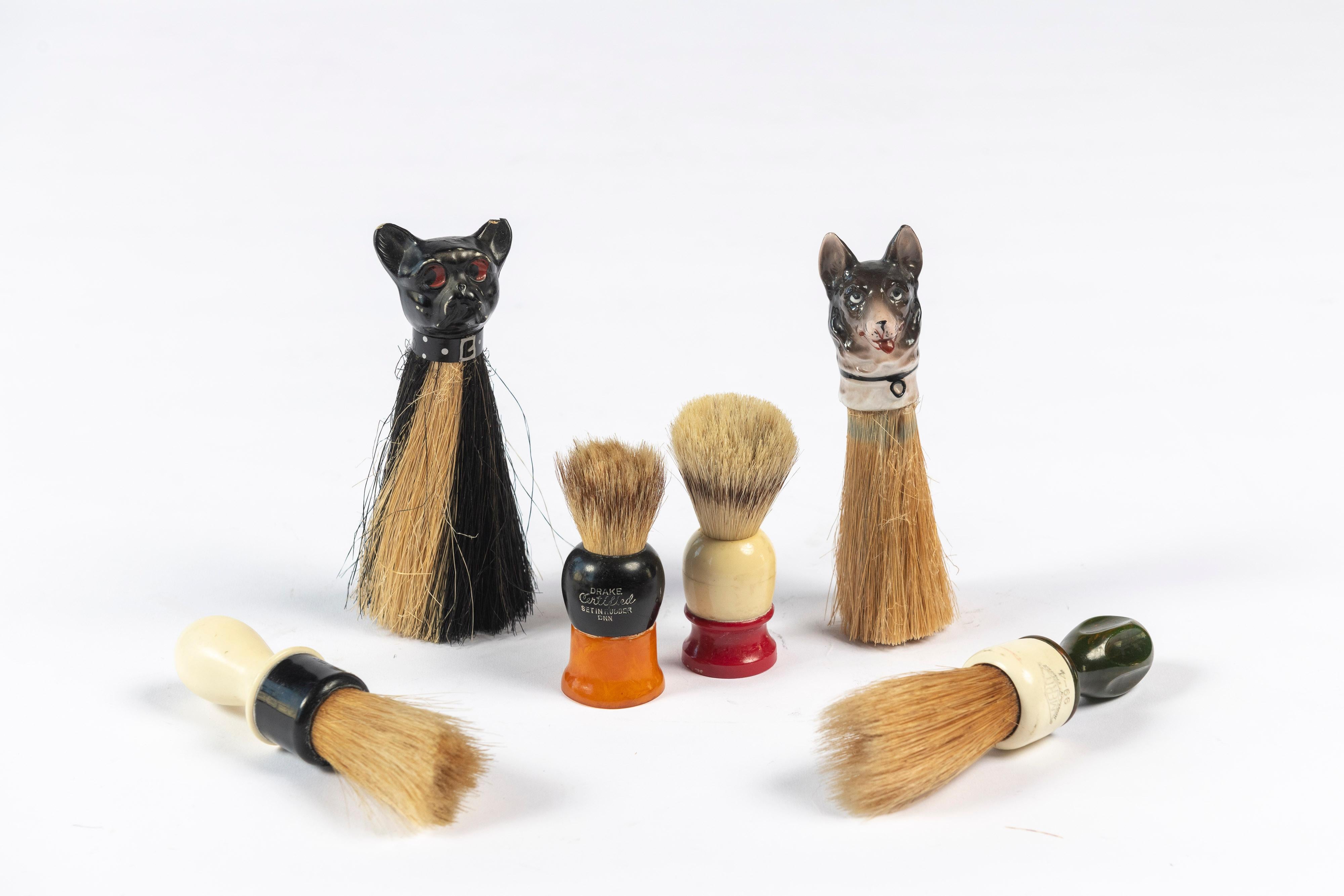Collection of 6 unique vintage shaving brushes, two with dog handles, 6