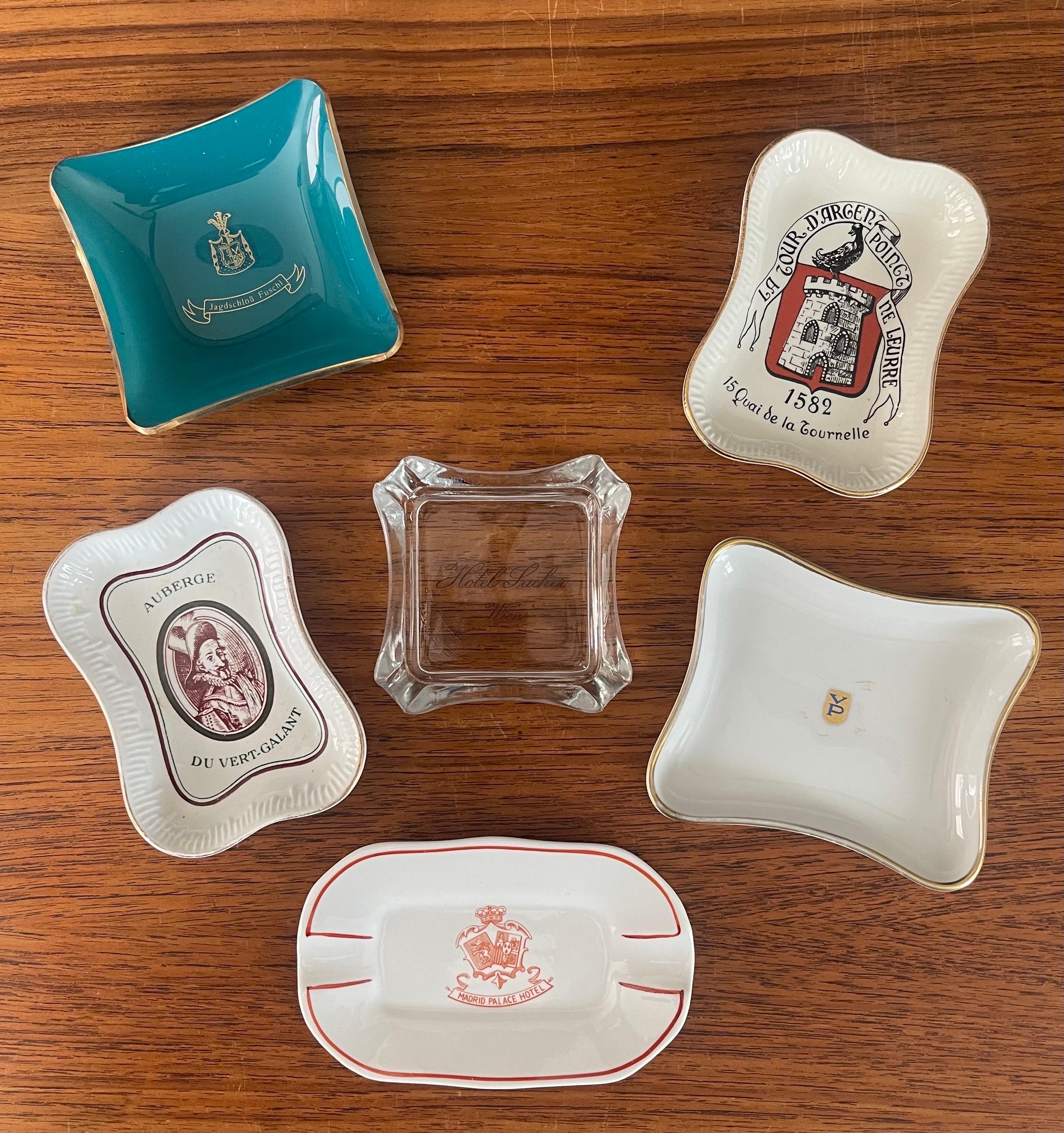 A very cool collection of six vintage European ashtrays from various hotels, circa 1960s. All of the ashtrays are in very good vintage condition with no chips or cracks and clear, crisp graphics. On average, they measure 3