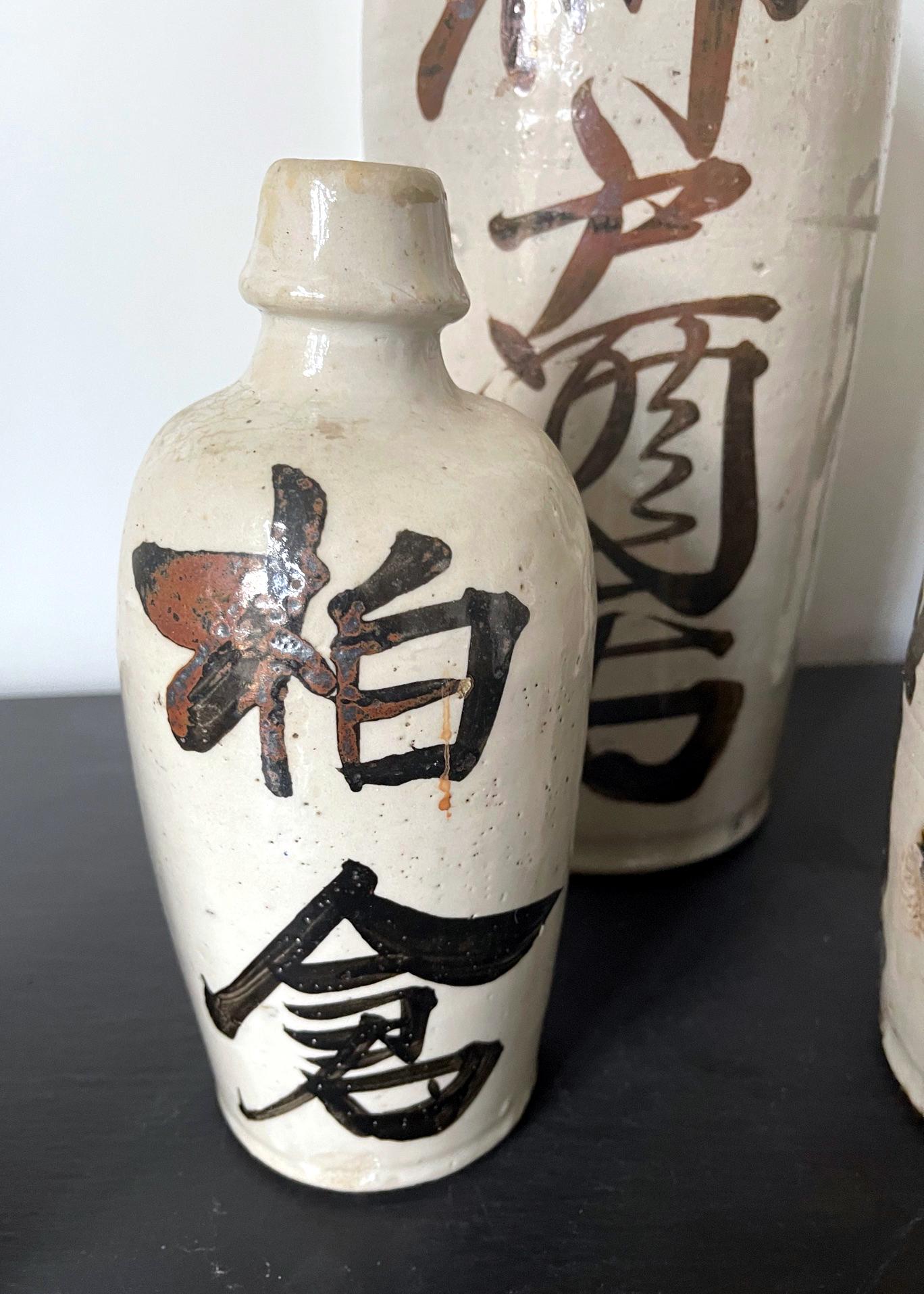 Japonisme Collection of Six Vintage Japanese Ceramic Sake Bottle