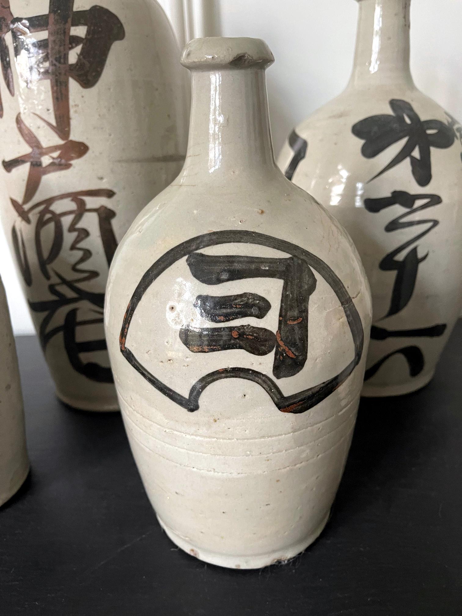 Collection of Six Vintage Japanese Ceramic Sake Bottle 1