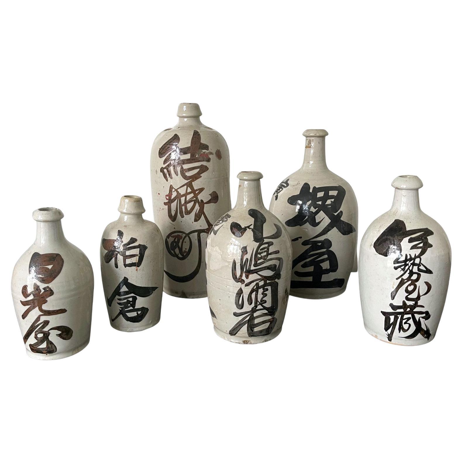 Collection of Six Vintage Japanese Ceramic Sake Bottle