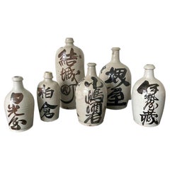 Collection of Six Antique Japanese Ceramic Sake Bottle