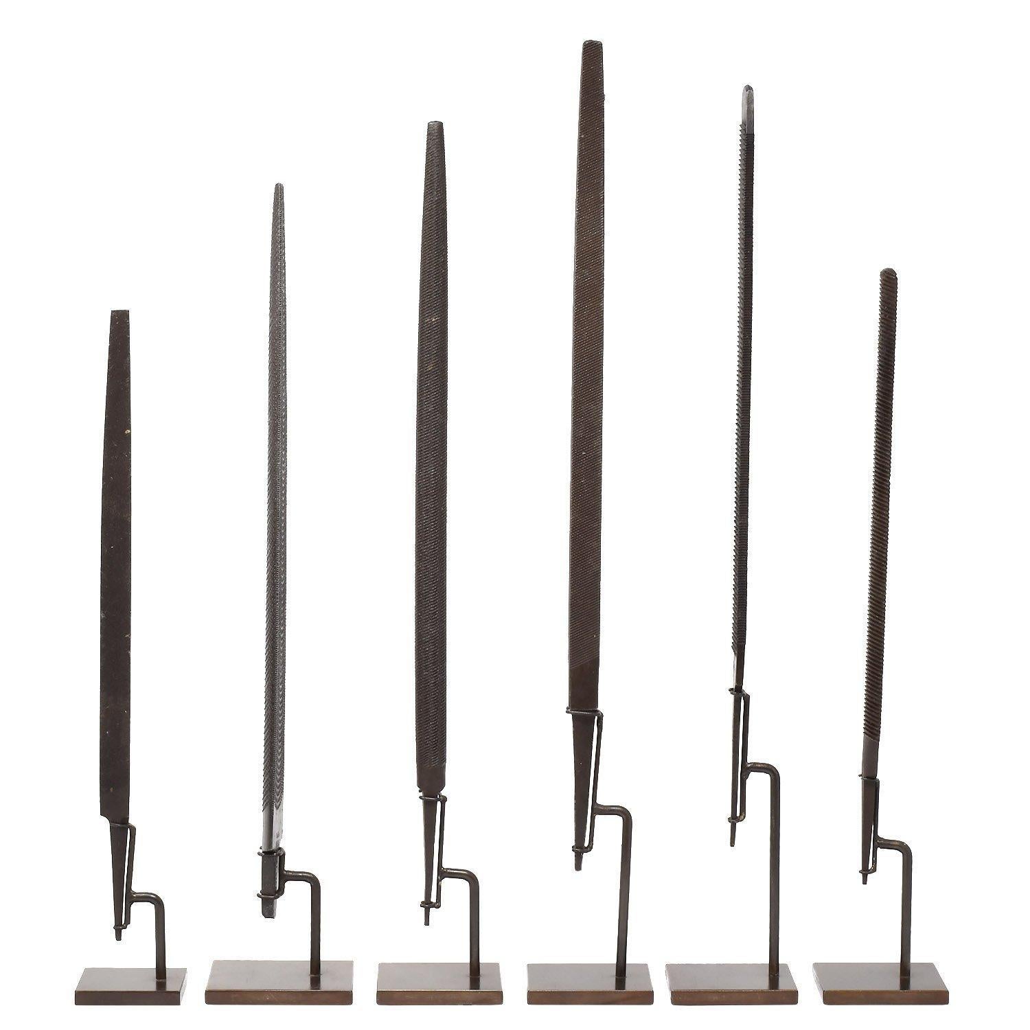 Collection of Six vintage woodworking files

United States
20th century
Cast steel
Height on custom display stands: 16.25 - 22.75 in. / 41 - 58 cm.