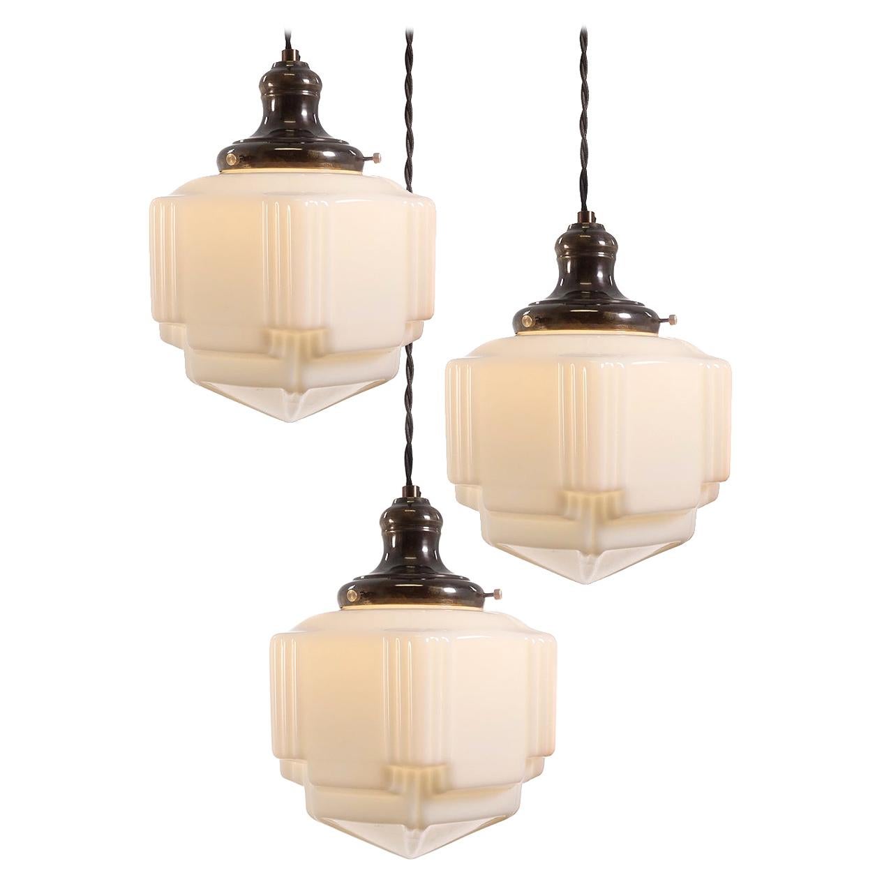 Collection of Small Milk Glass Skyscraper Art Deco Pendents