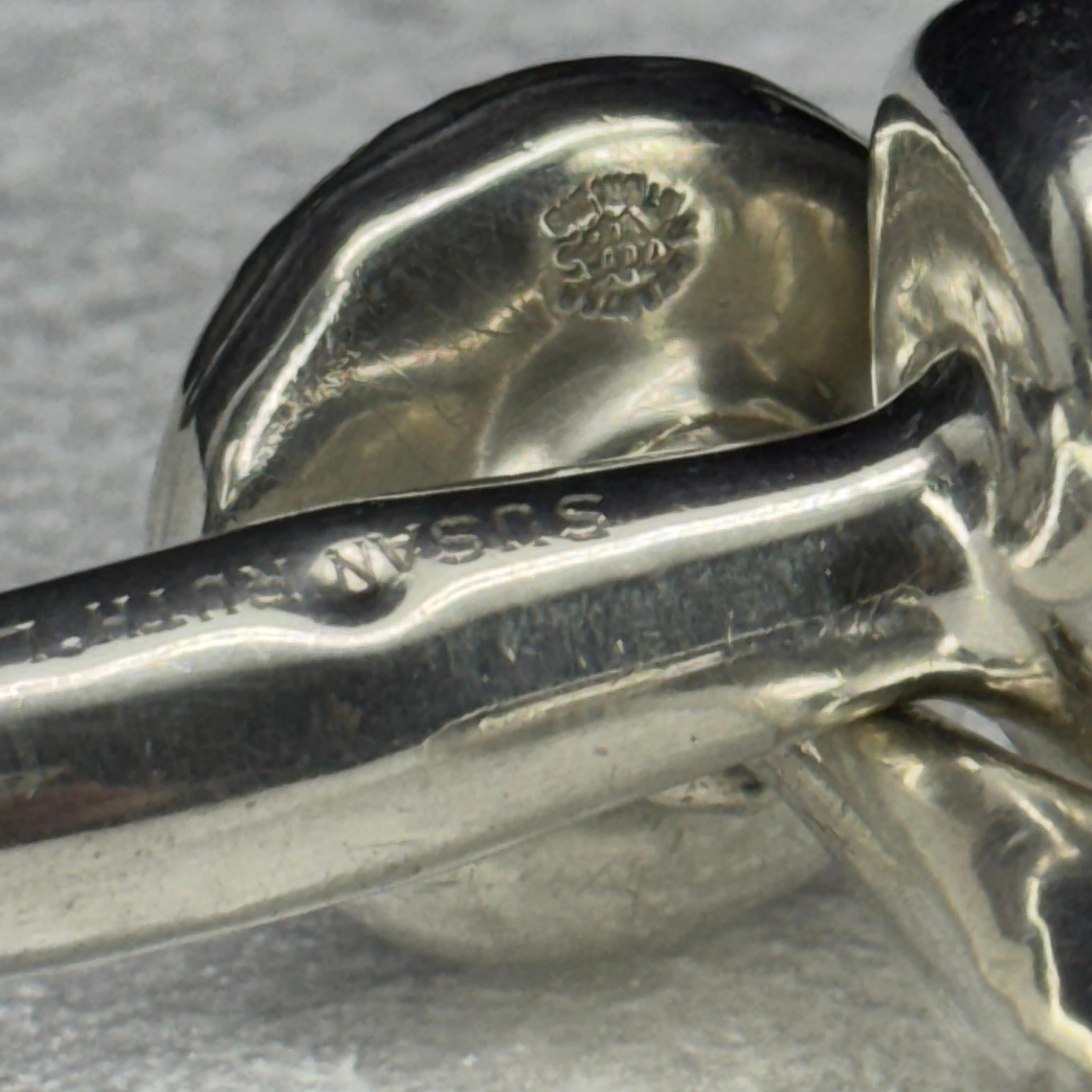 Colección de sonajeros y mordedores de plata de ley, c. 1910-1930 6