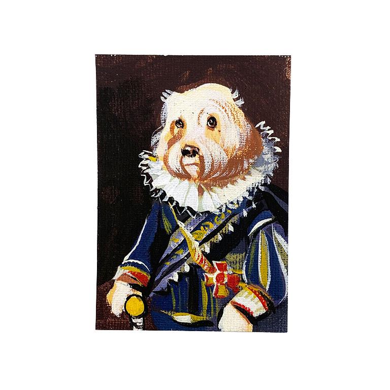 A set of four small hand-painted dog portrait paintings. Each dog Is dressed in period attire and wears a military or royal style uniform. This surrealist collection will be fabulous framed in small giltwood frames as a collection, or on their own