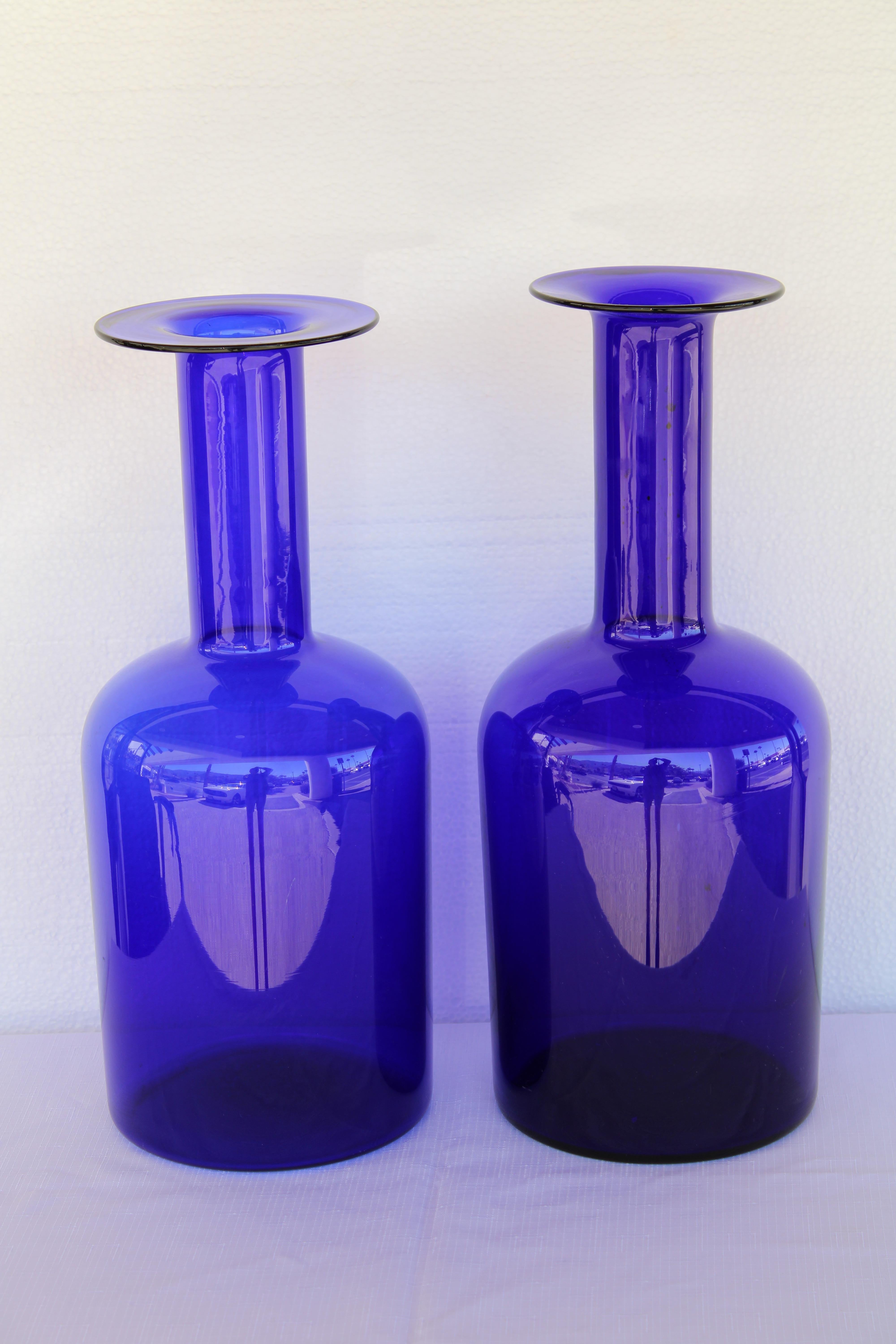 Collection of ten blue bottles by Otto Brauer for Holmegaard.   Two large bottle measures 16.75