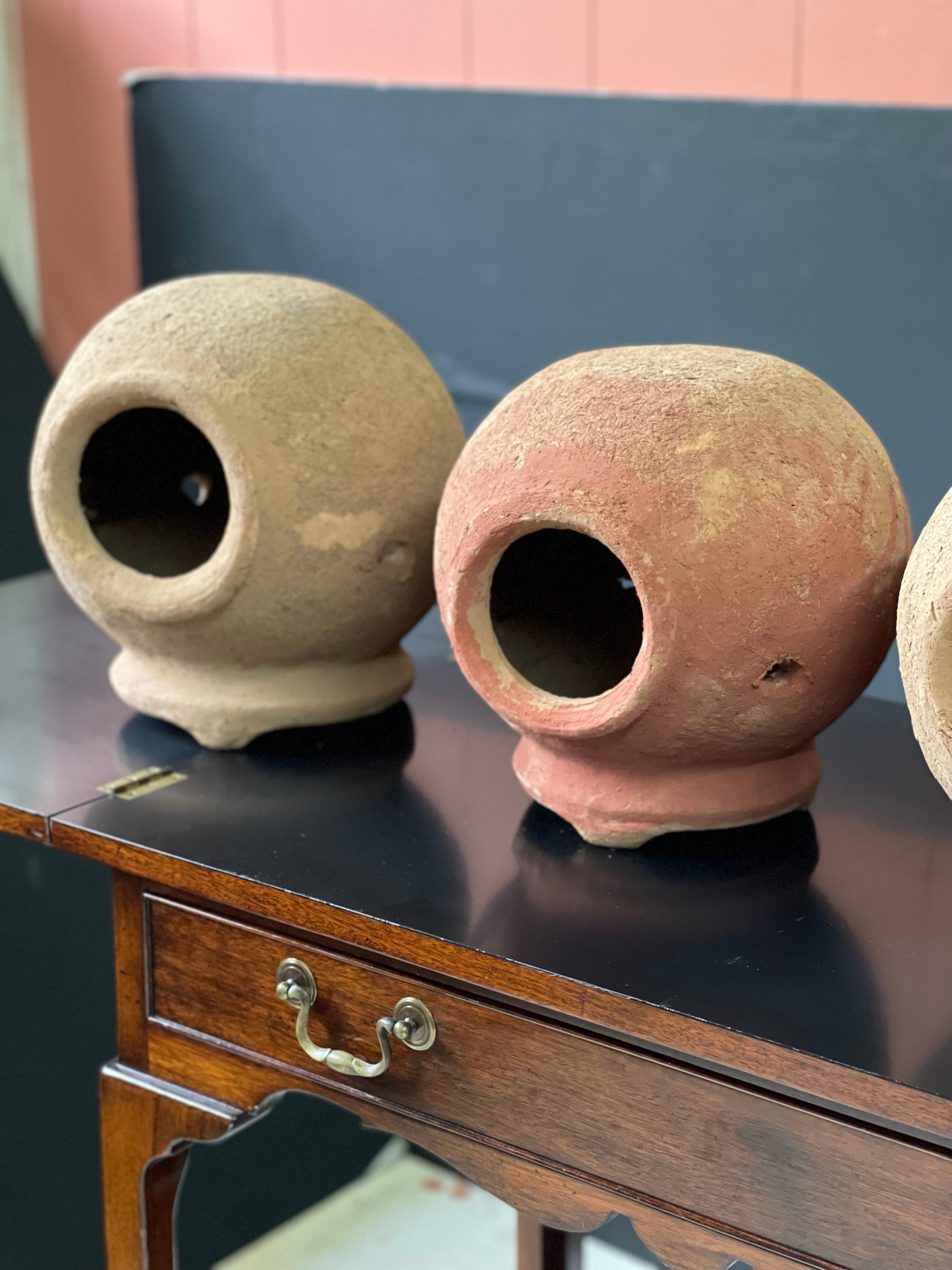 Collection of four vintage Mediterranean handmade terracotta pots. Use your imagination to display these amazing pieces as sculpture, use as planters, or convert into lighting.
