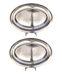 Collection de treize plats de service en argent