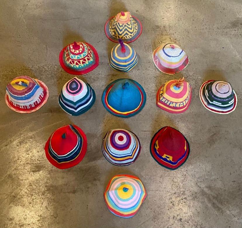 ‍Traditionally worn by men of the Dorze culture in Southern Ethiopia, these tightly-woven hats each feature an idiosyncratic, characterful appearance formed through a combination of striking colours and patterns. For some of the hats in the group,