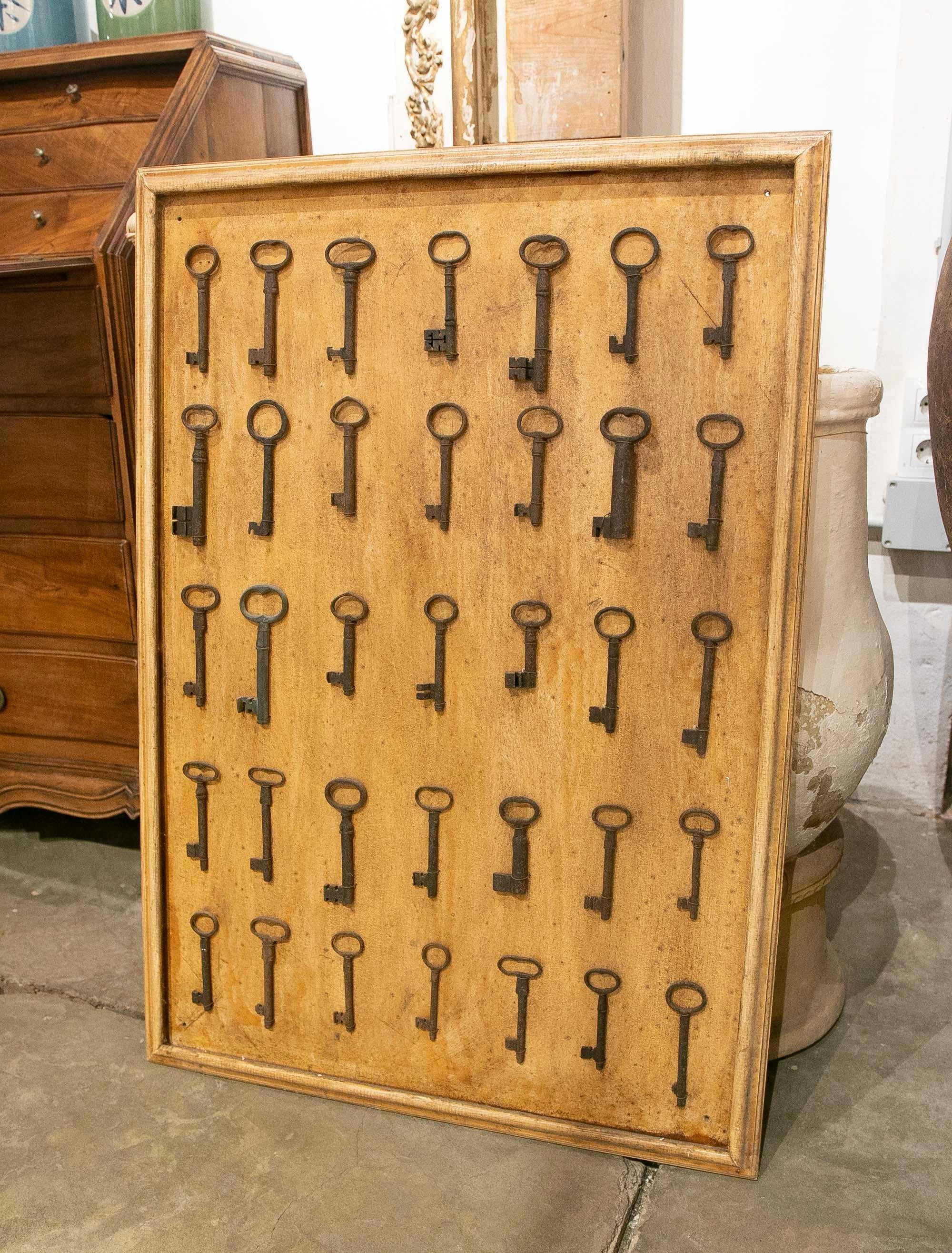Collection of Thirty-Five Framed Antique Iron Keys  For Sale 1