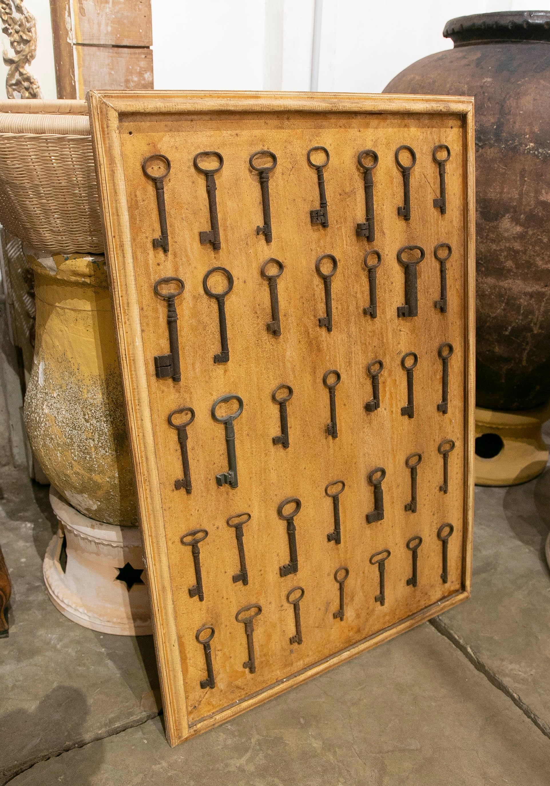Collection of Thirty-Five Framed Antique Iron Keys  For Sale 2