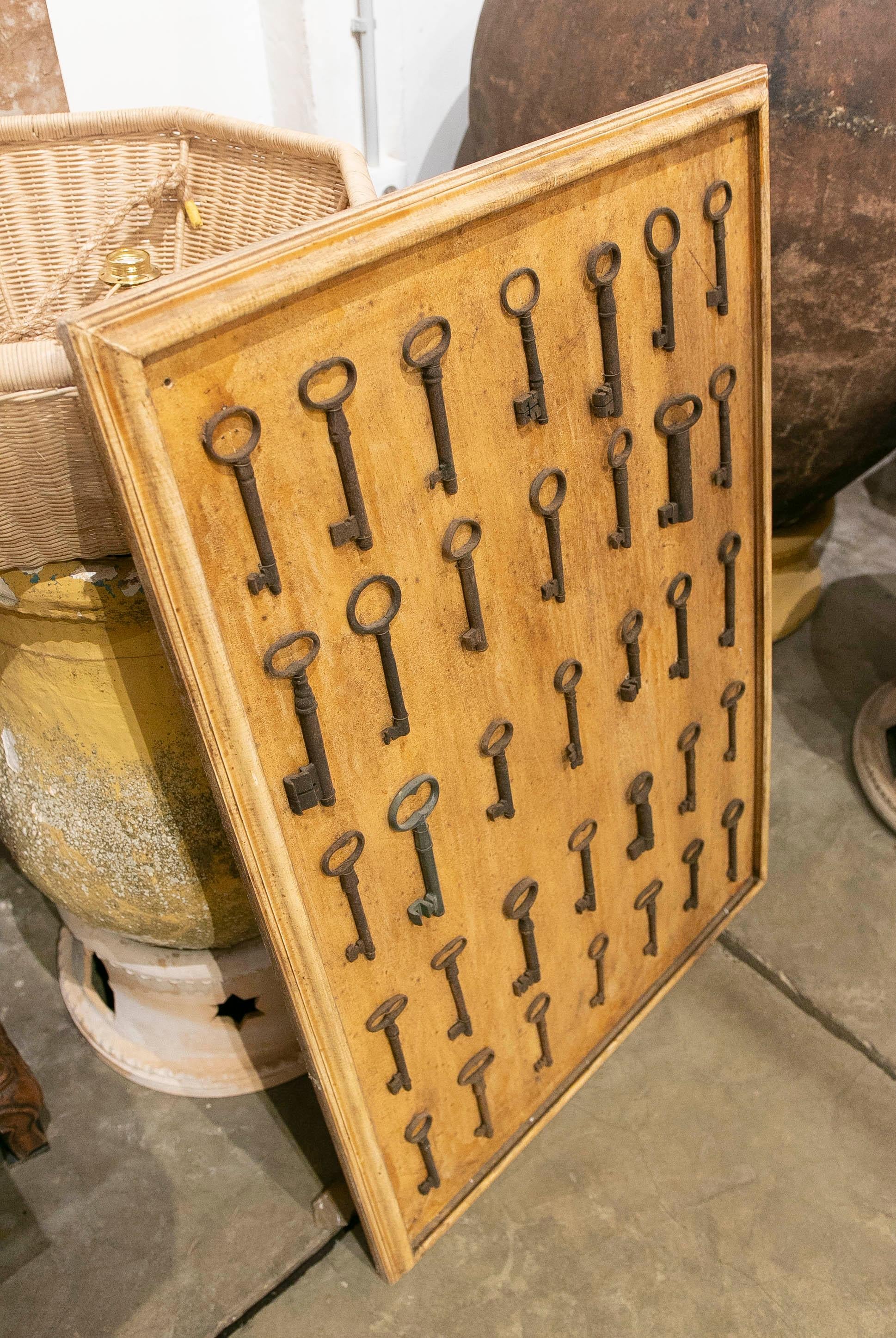 Collection of Thirty-Five Framed Antique Iron Keys  For Sale 3