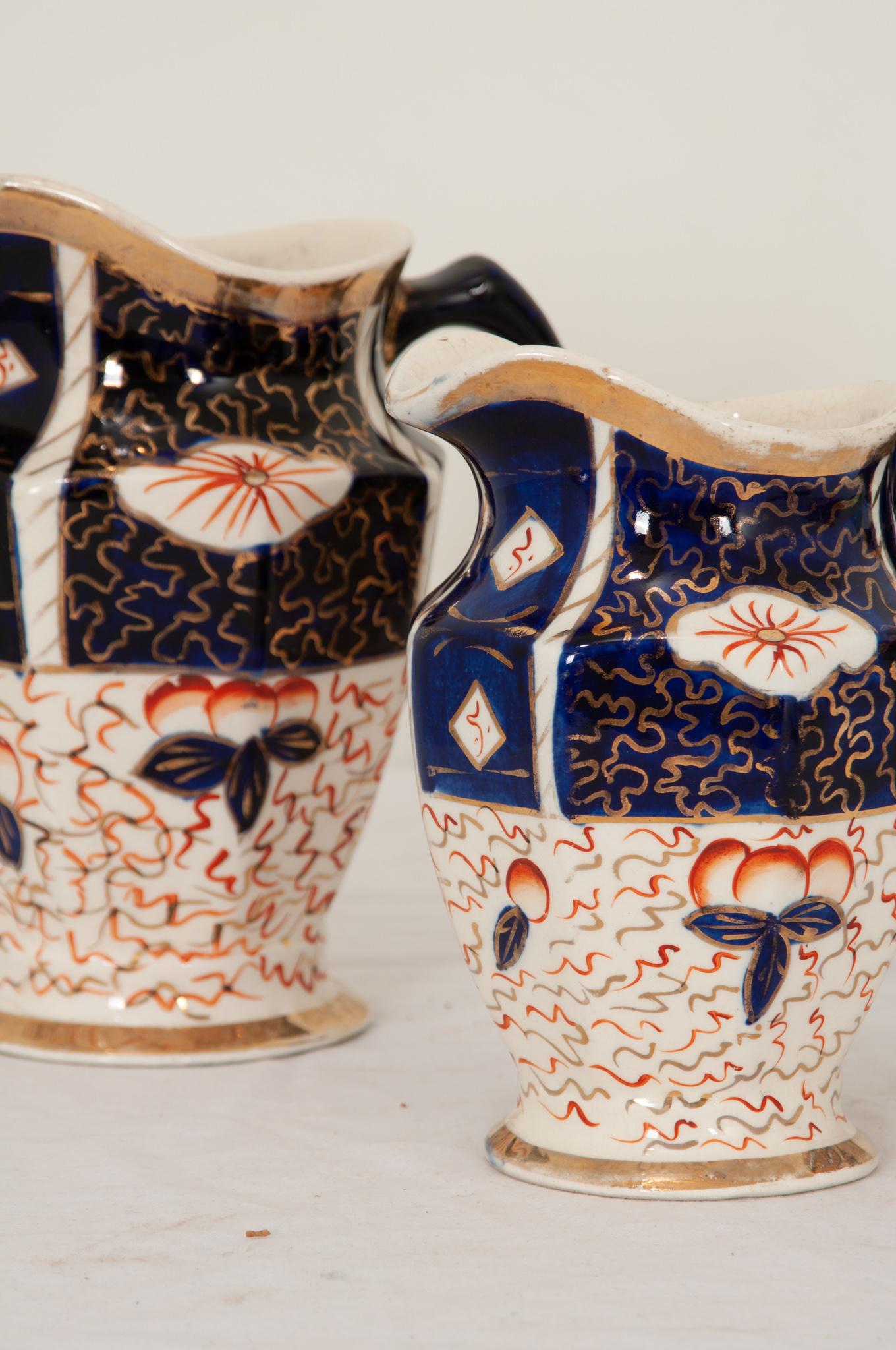 Porcelain Collection of Three 19th Century Aesthetic Movement Pitchers For Sale