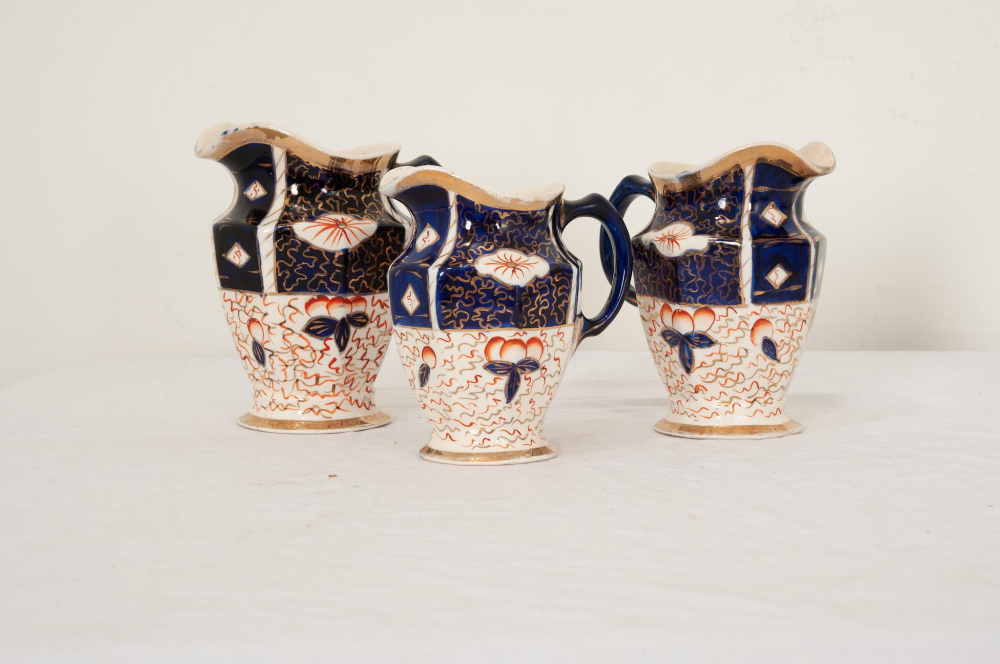 Collection of Three 19th Century Aesthetic Movement Pitchers For Sale 1