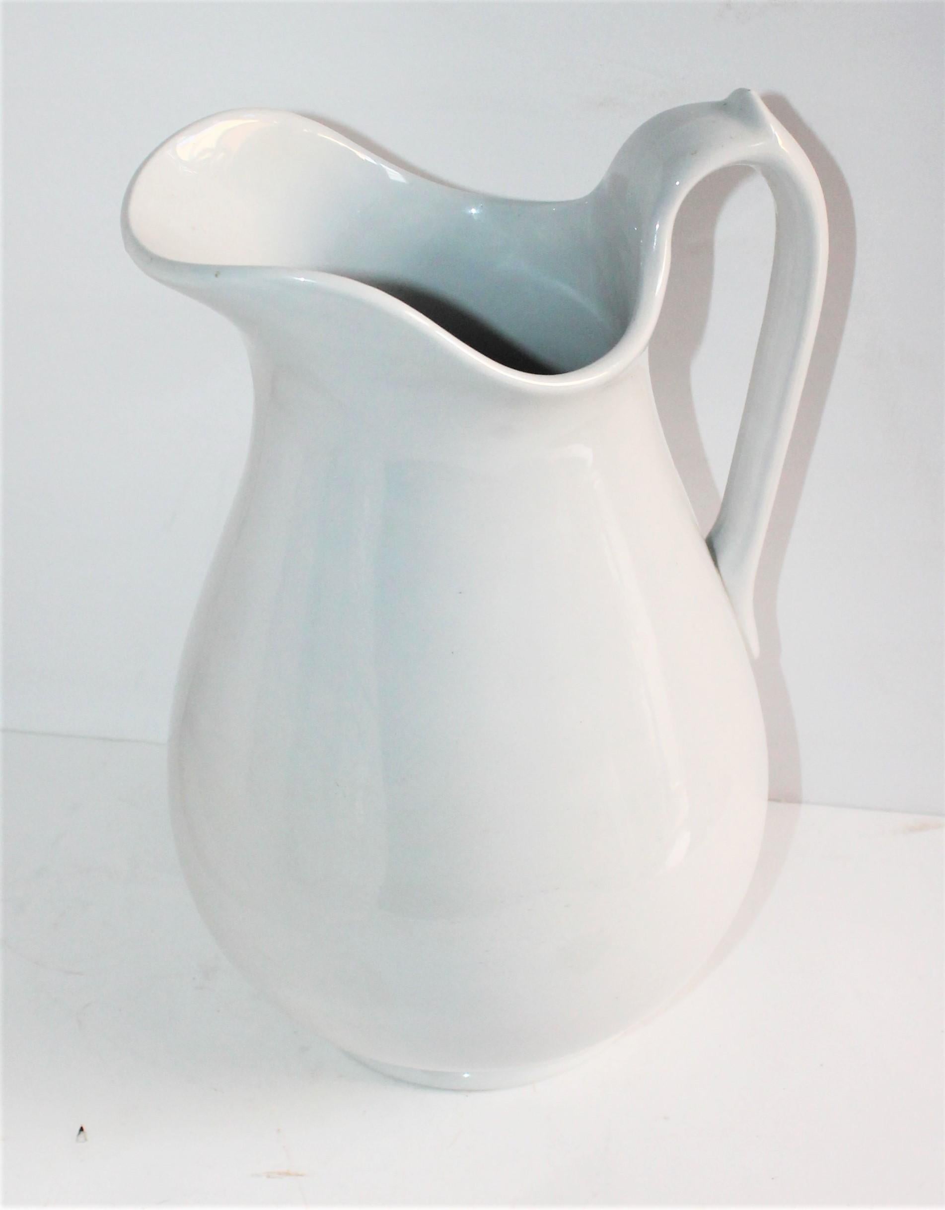 American Classical Collection of Three 19th Century Ironstone Water Pitchers For Sale