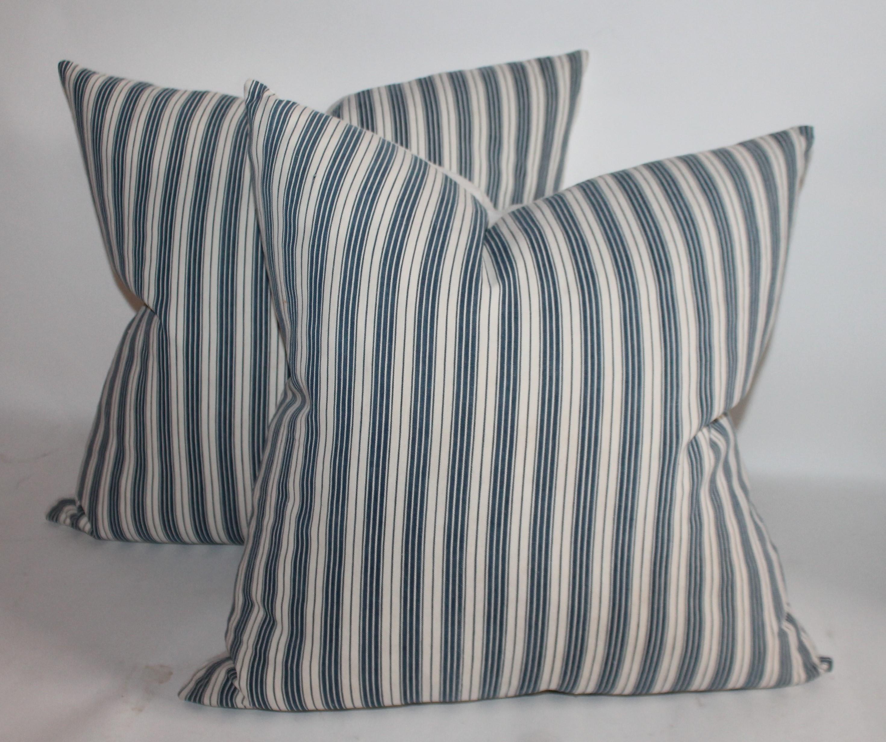 19th century Ticking Pillows with white cotton linen backs. There are one pair of 20 x 20 and one 22 x 22.
2 - 20 x 20
1 - 22 x 22.