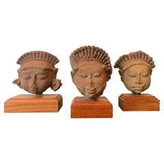 Used Collection of Three Indian Sandstone Carved Heads of Deities