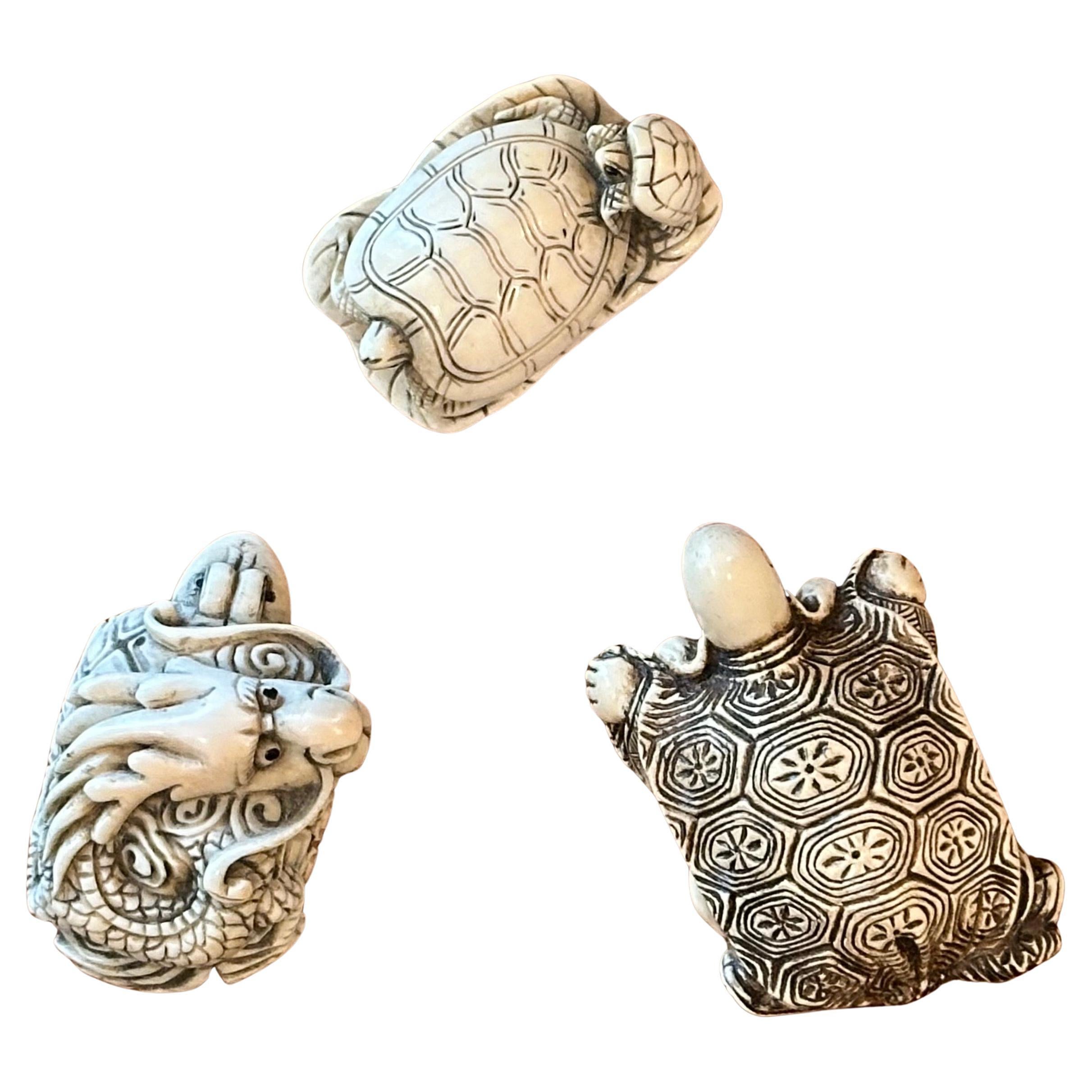 Fun collection of three Japanese turtle netsukes hand-carved from resin, circa 1960s. They are in good condition and measure and one is signed. Great little collection! #4863
