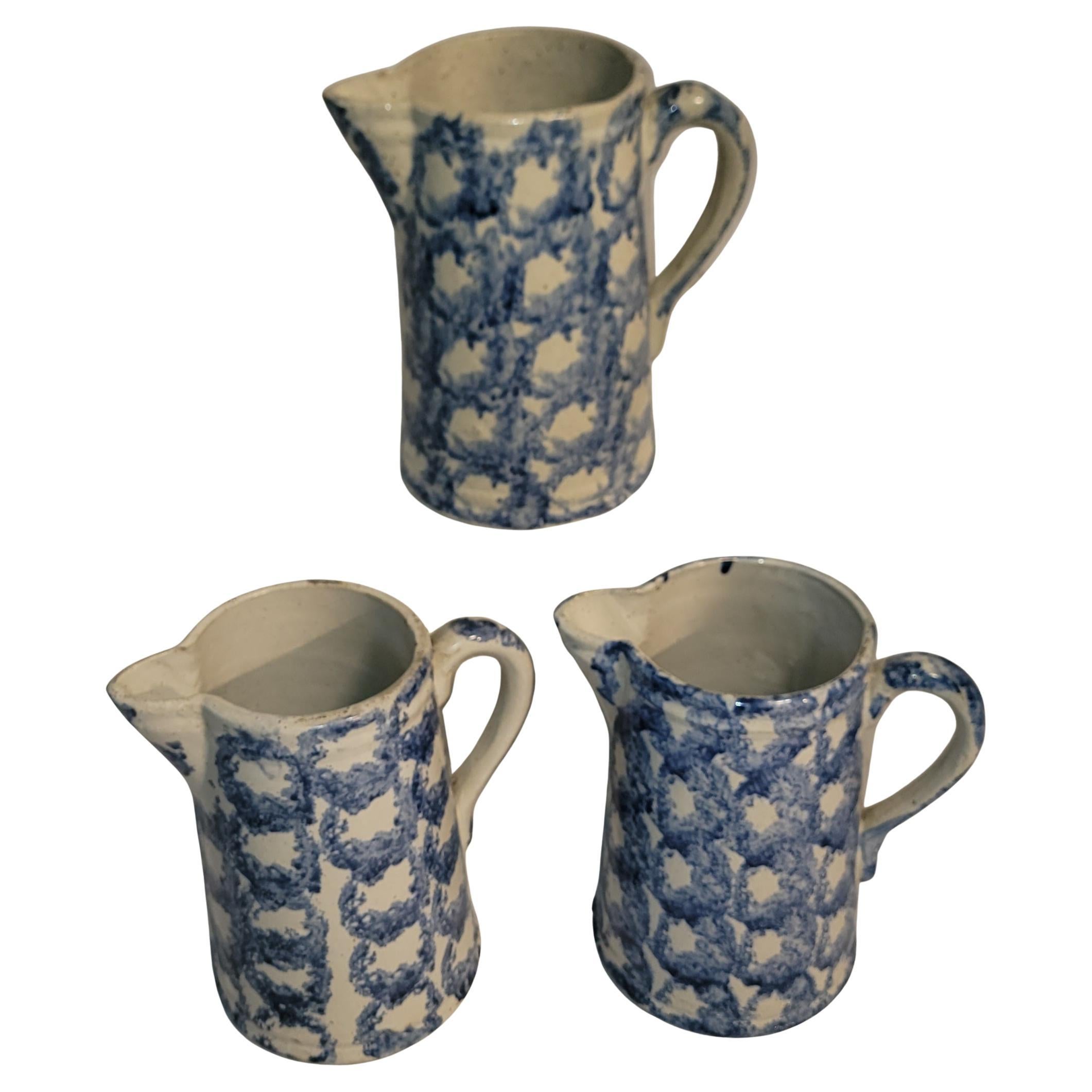 Collection of Three Smoke Ring Sponge Ware Pitchers