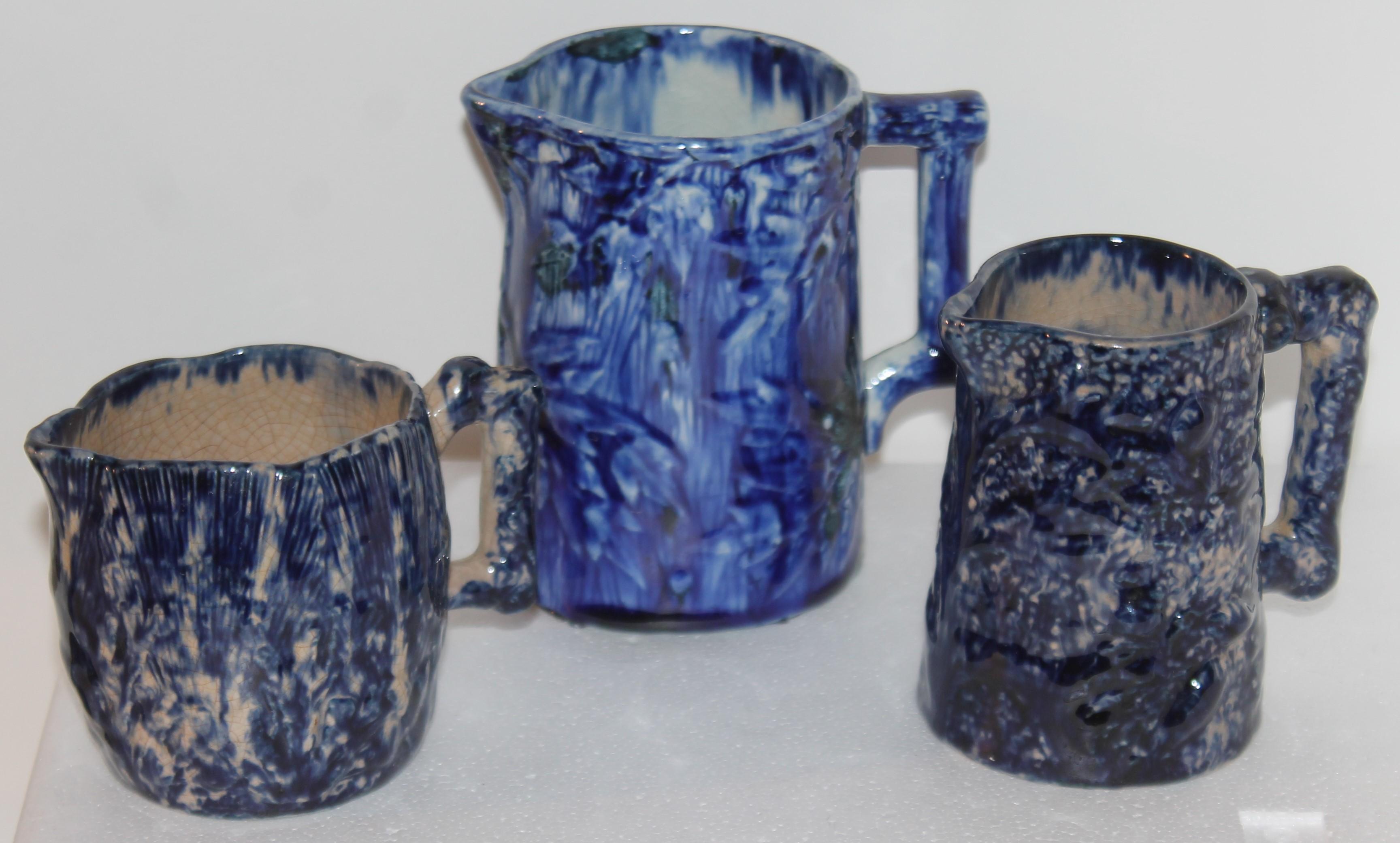 These fantastic blue & white sponge ware pottery pitchers are in fine condition. Hard to find shapes and sizes.
Pitchers measurement are approximate -

5.5 deep x 5high x 3.5 wide 

4.5 deep x 4.5 high x 3.25 wide 

4.75 deep x 3.25 high x