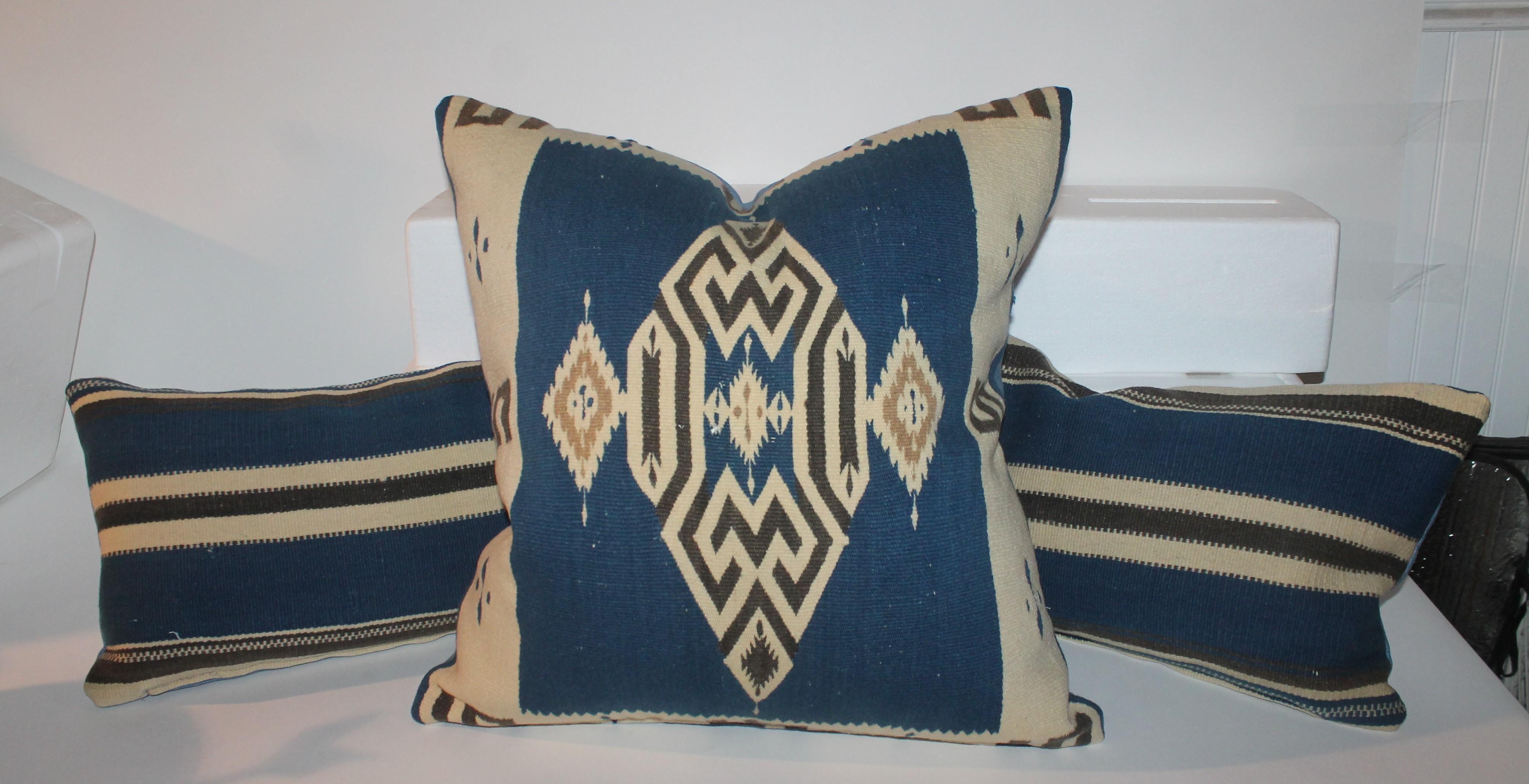 These fine Tex coco Mexican Indian weaving pillows are in fine condition and have cotton linen backings.

Measures: 25 x 12 kidney pillows
23 x 23 large square pillow.