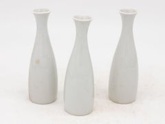 Collection of Three White Single Bud Vases, French Early 21st C.