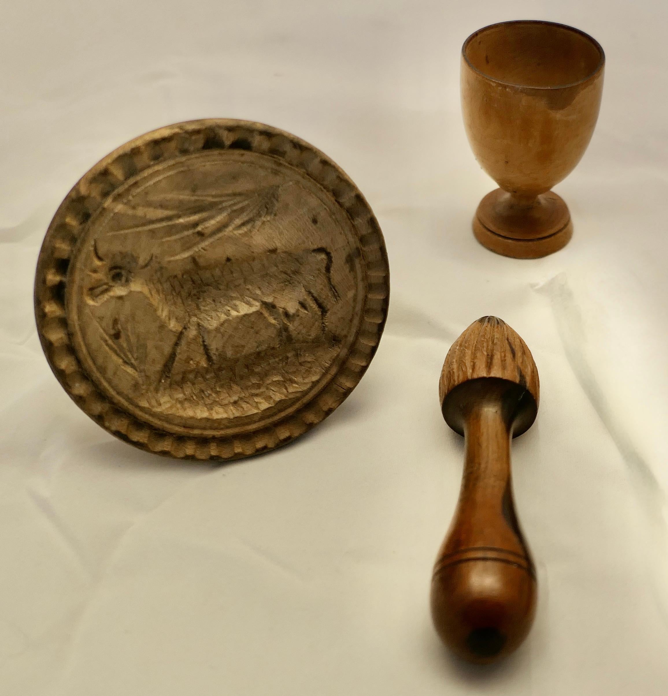 Collection of Treen Kitchenalia, Butter Marker

This is a great little Collection of Treen Kitchenalia, a Butter Marker, this has a naive cow carving, a lemon squeezer and a turned sycamore egg cup

A good set for the collector, a bit of historical
