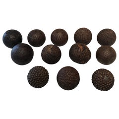 Collection of Twelve 19th Century French Iron-Studded Pétanque Boules