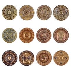 Collection of Twelve Hispano-Moresque Earthenware Chargers, 16th-19th Century