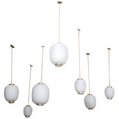 Collection of Twelve Opaline Glass and Brass Ceiling Fixtures for Lyfa, 1950s
