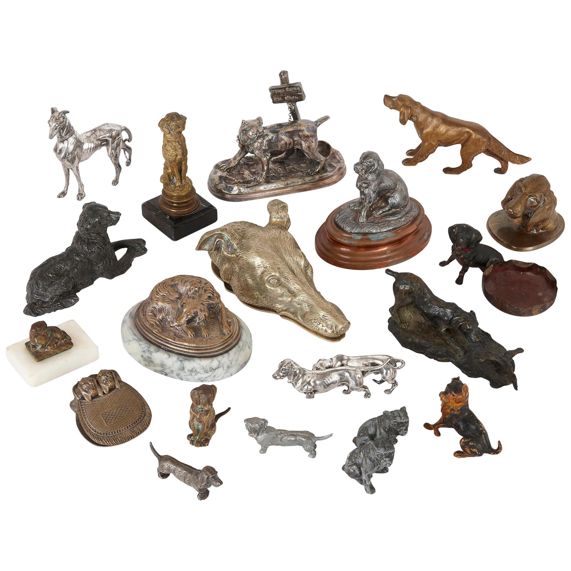 Collection of Twenty Metal Dogs of Various Types For Sale