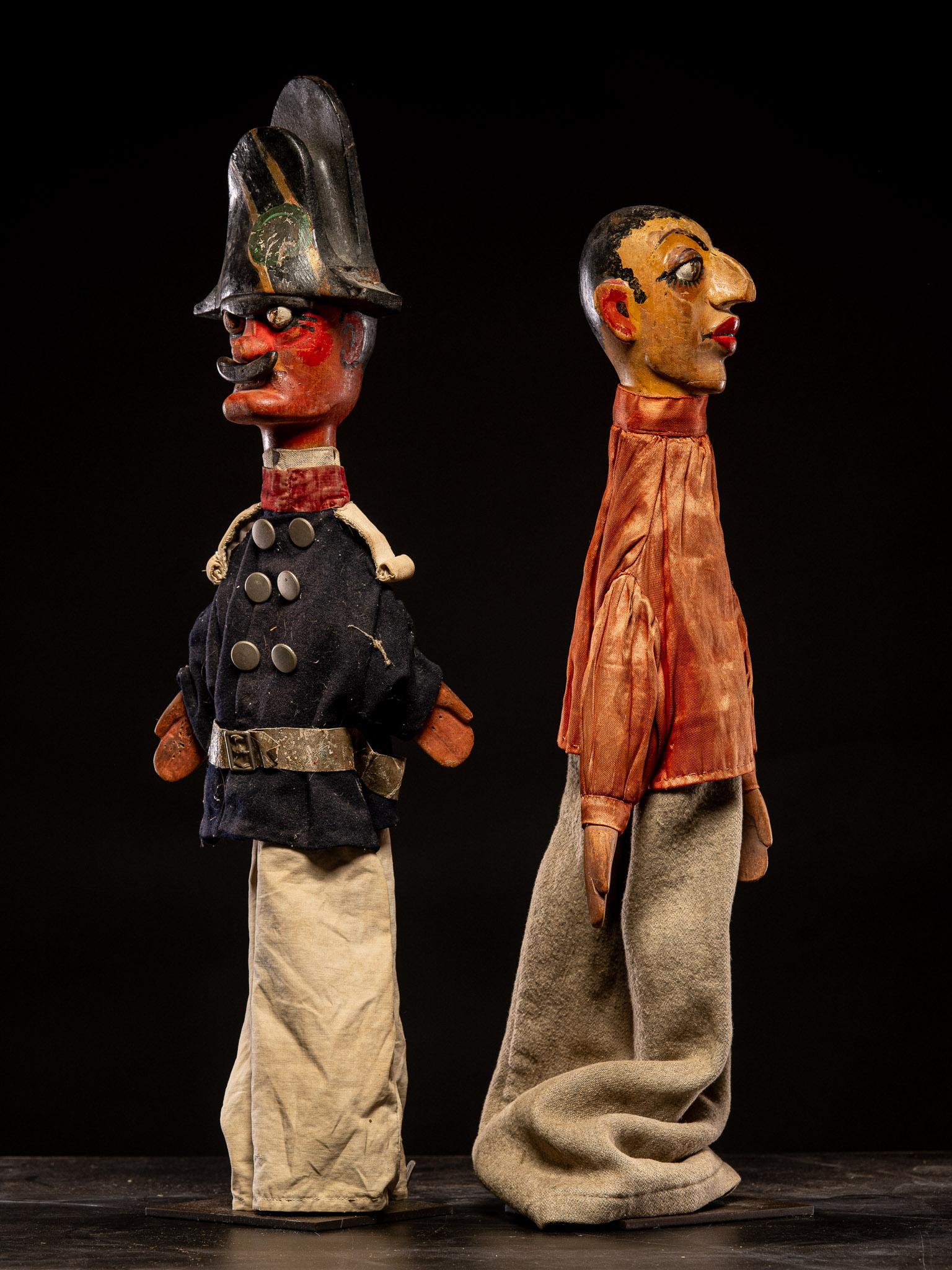 Rare untouched examples of hand crafted early 19th century marionette puppets, French in origin. Their heads made from carved pine, arms and bodies hand sewn and in their original clothing
Glove puppets are animated by the hand of the puppeteer, who