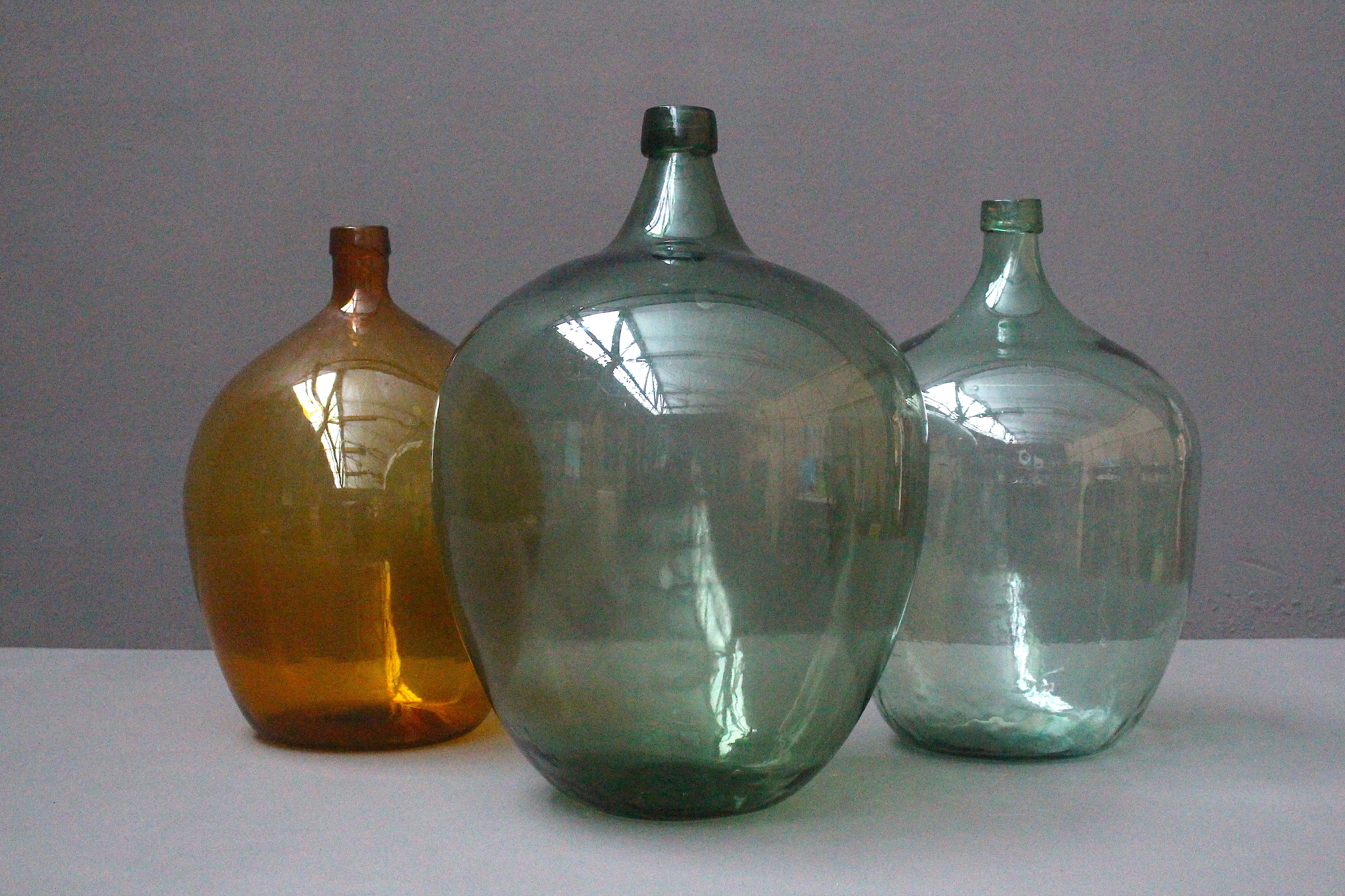 Lovely collection of French hand blown glass wine bottles from circa 1900.
Very decorative pieces.
These bottles have some beautiful air bubbles in the glass.
The ombre color is very unique.